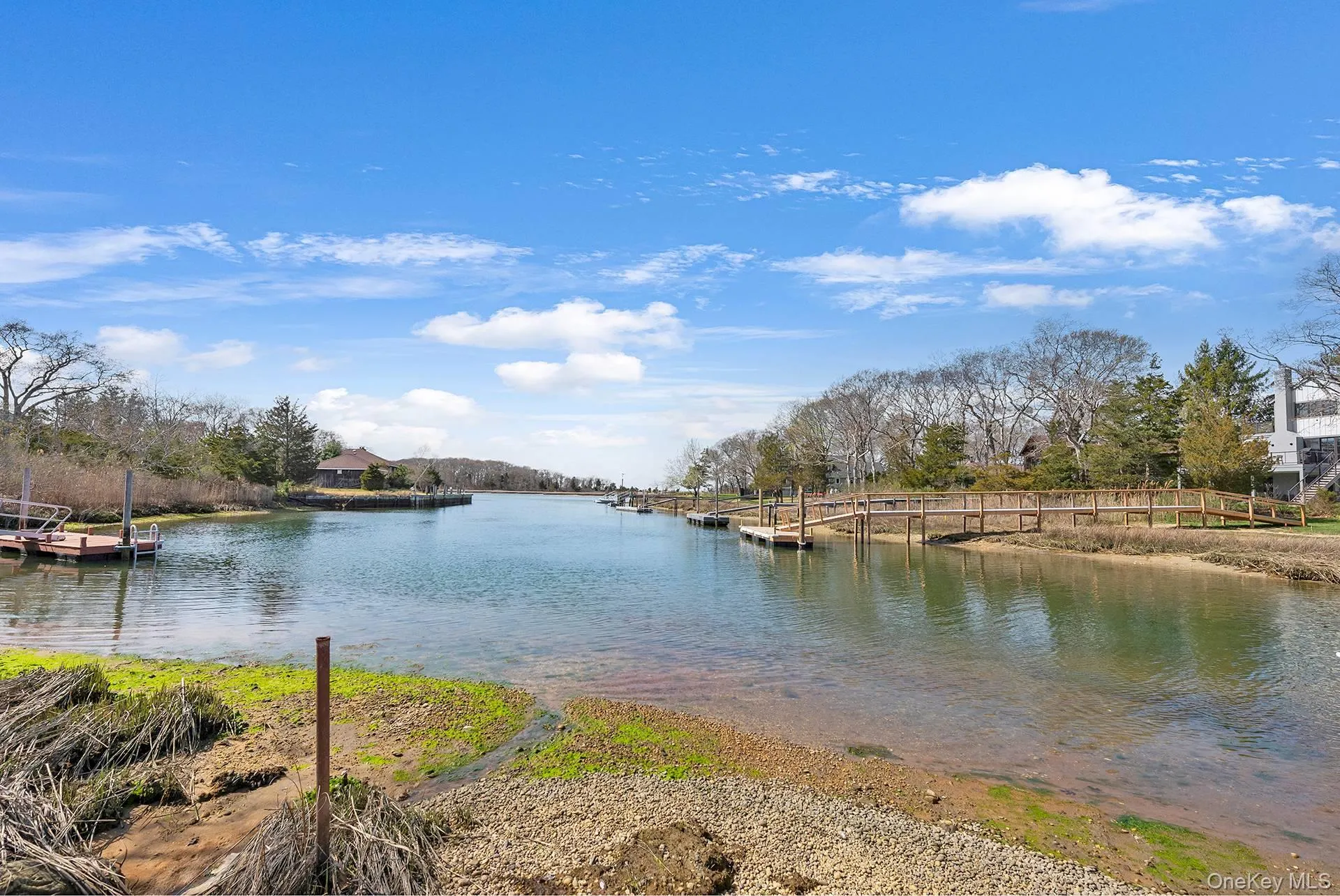 View of water feature with a dock View of water feature with a dock