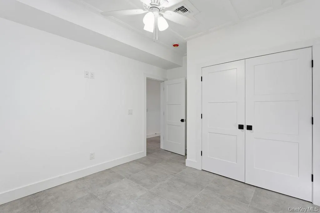 Unfurnished bedroom featuring a closet and ceiling fan Unfurnished bedroom featuring a closet and ceiling fan