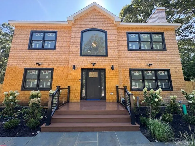 View of front of property featuring a chimney View of front of property featuring a chimney