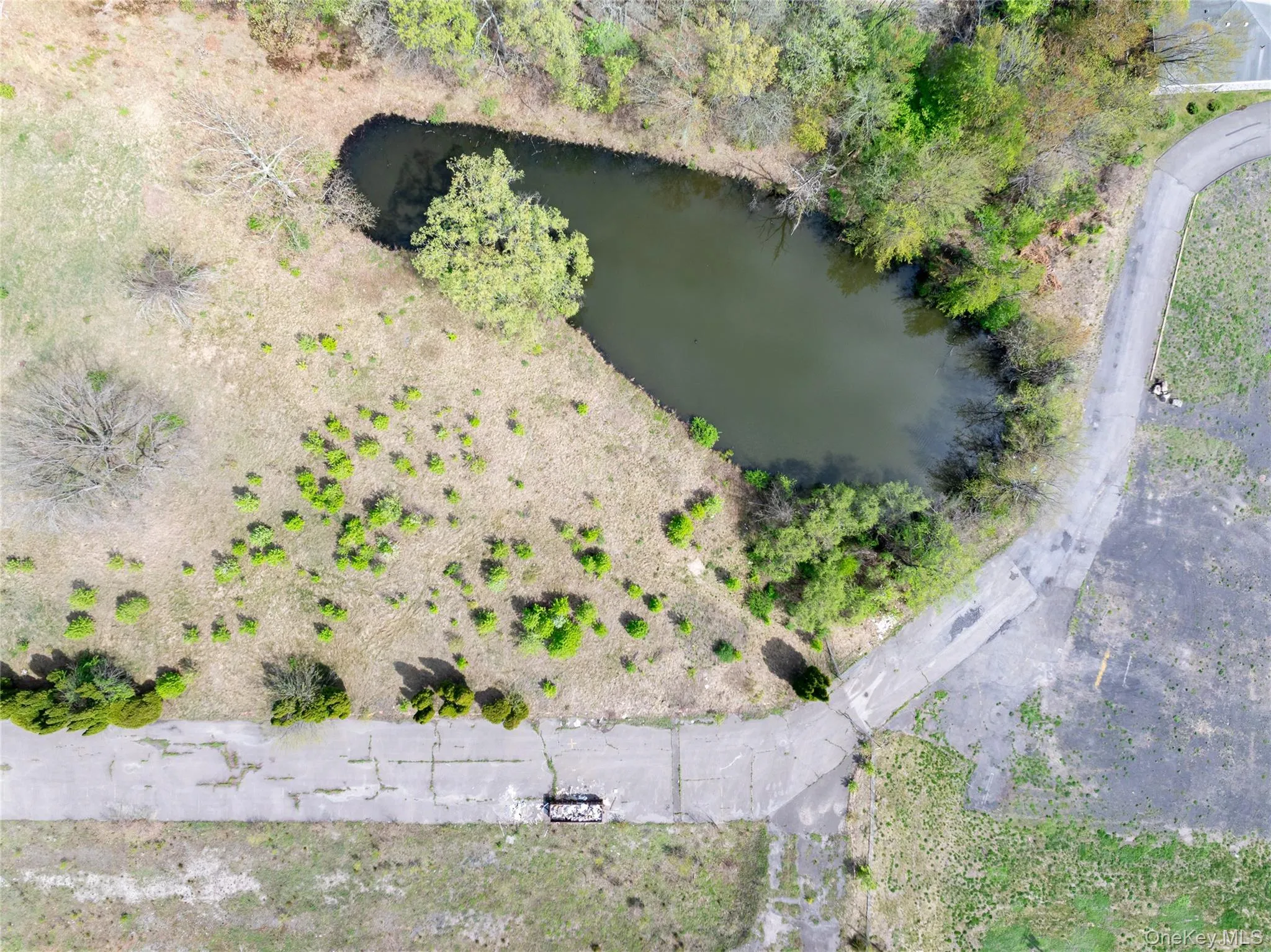 Birds eye view of property featuring a water view Birds eye view of property featuring a water view