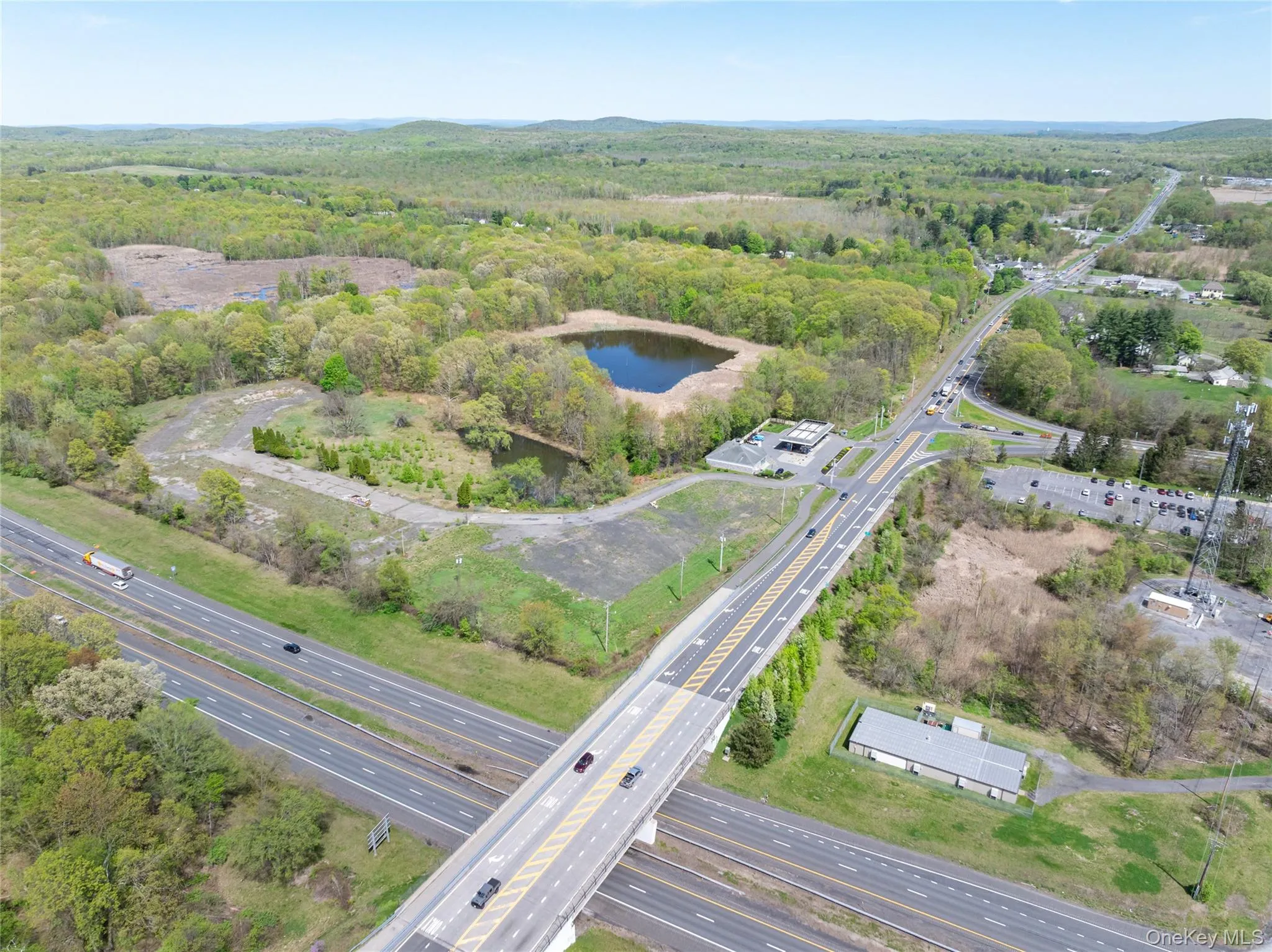 Bird's eye view with a water view and a wooded view Bird's eye view with a water view and a wooded view