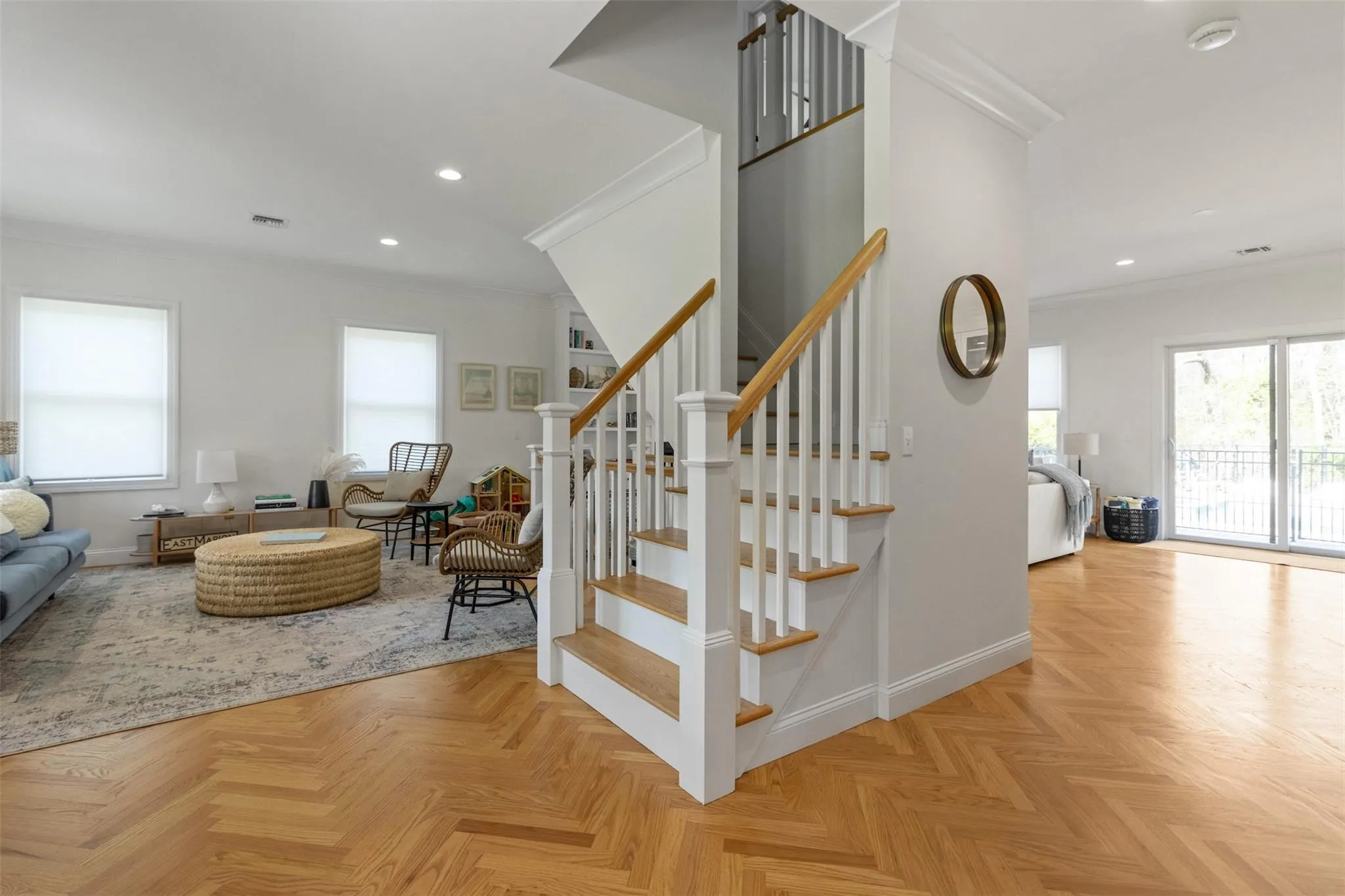 Stairway with crown molding, recessed lighting, baseboards, and visible vents Stairway with crown molding, recessed lighting, baseboards, and visible vents