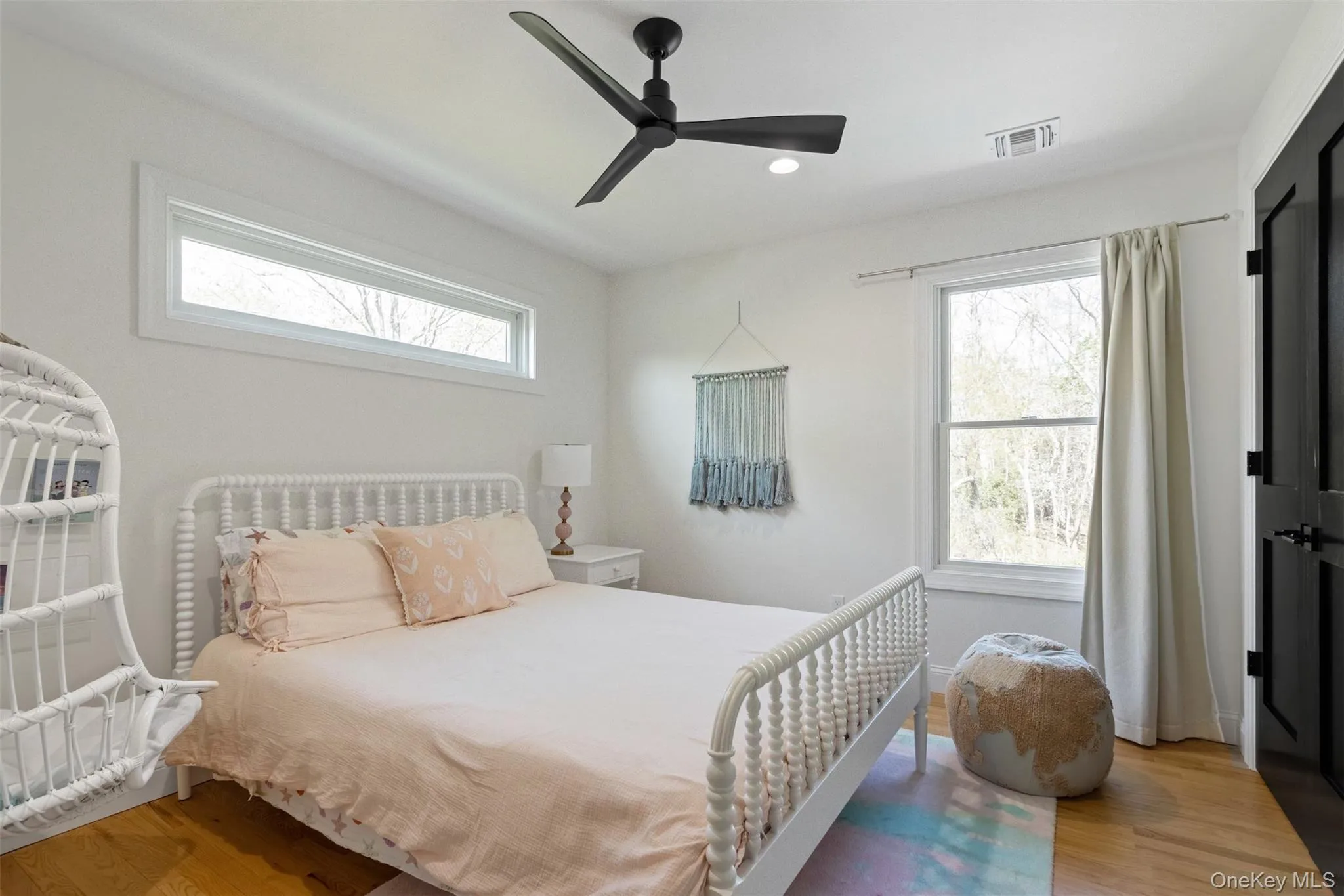 Bedroom featuring visible vents, recessed lighting, ceiling fan, and wood finished floors Bedroom featuring visible vents, recessed lighting, ceiling fan, and wood finished floors