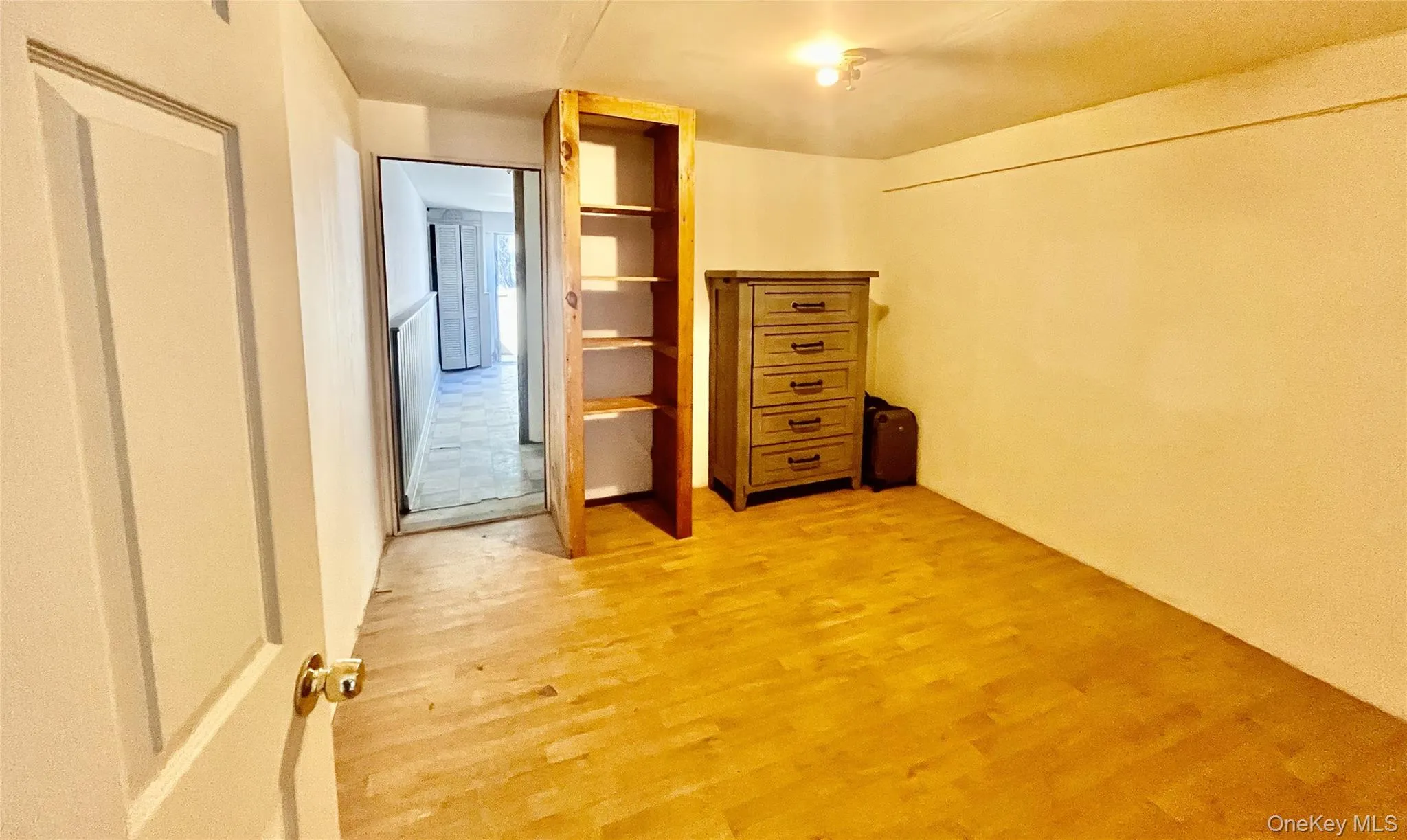 Unfurnished bedroom with light wood-type flooring Unfurnished bedroom with light wood-type flooring