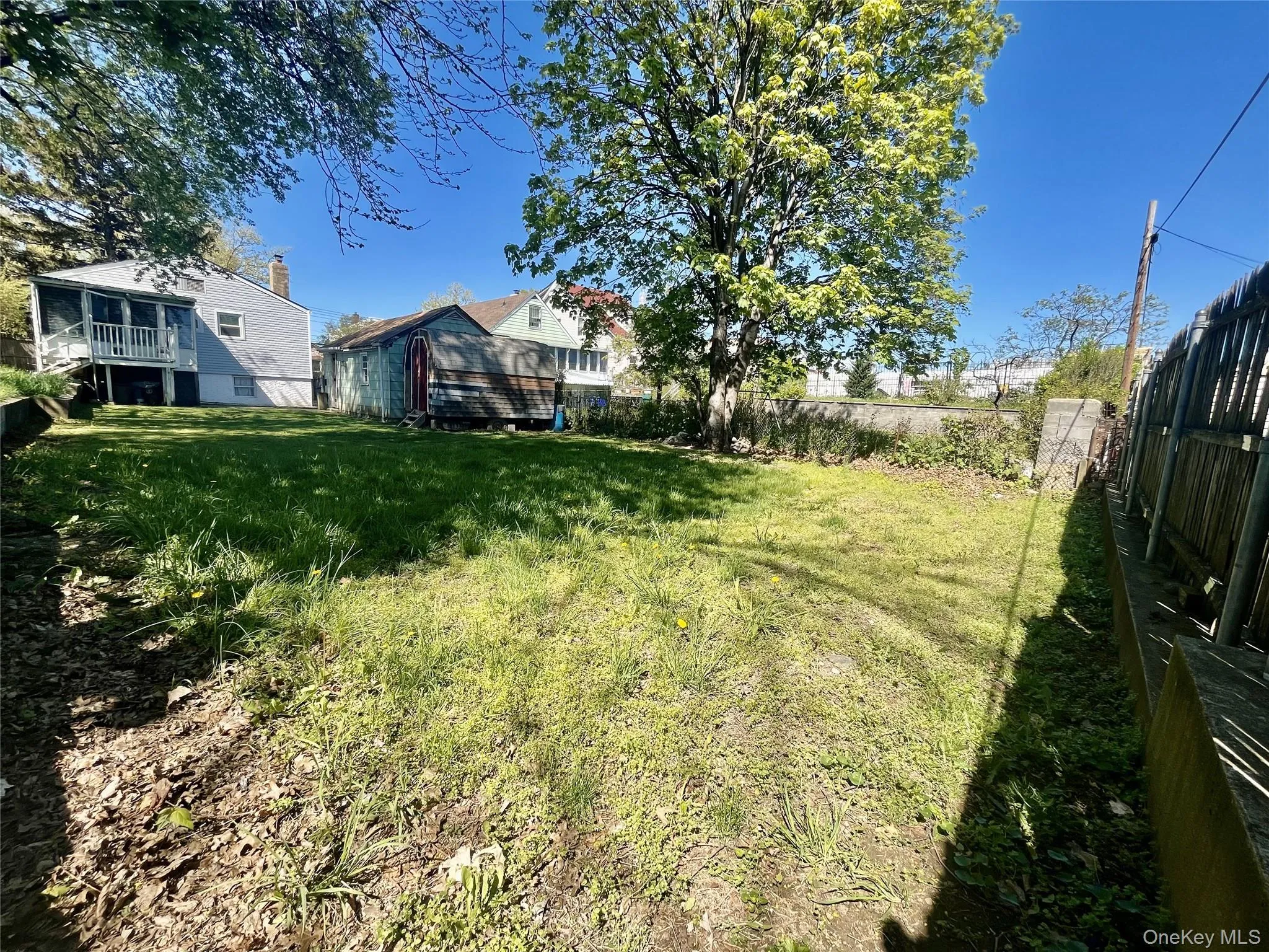 View of yard featuring a fenced backyard View of yard featuring a fenced backyard