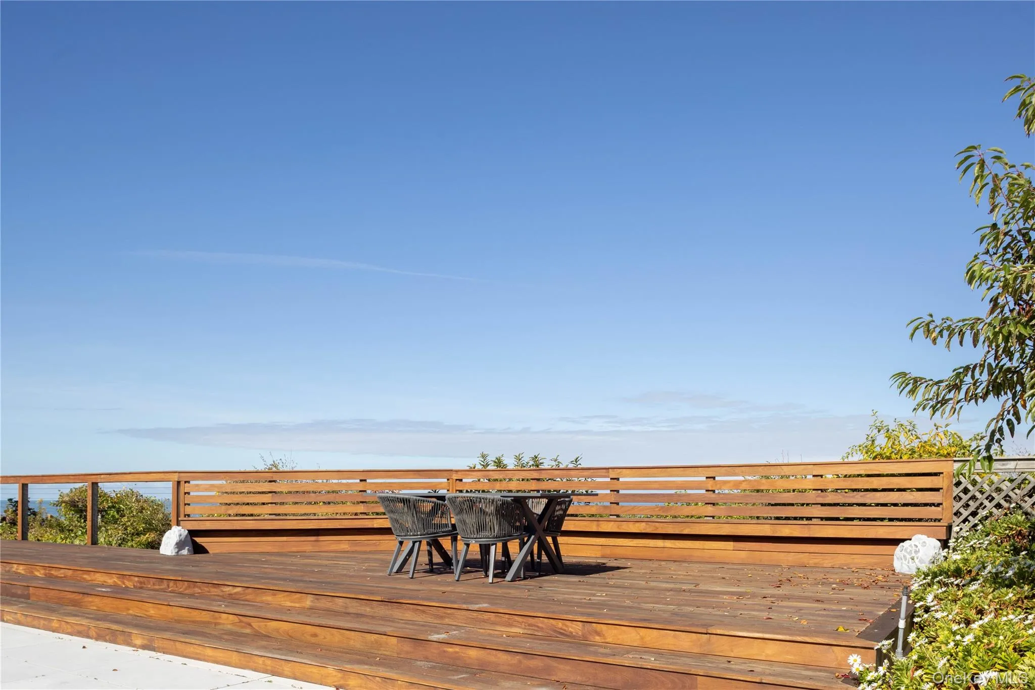 Wooden terrace with outdoor dining space Wooden terrace with outdoor dining space