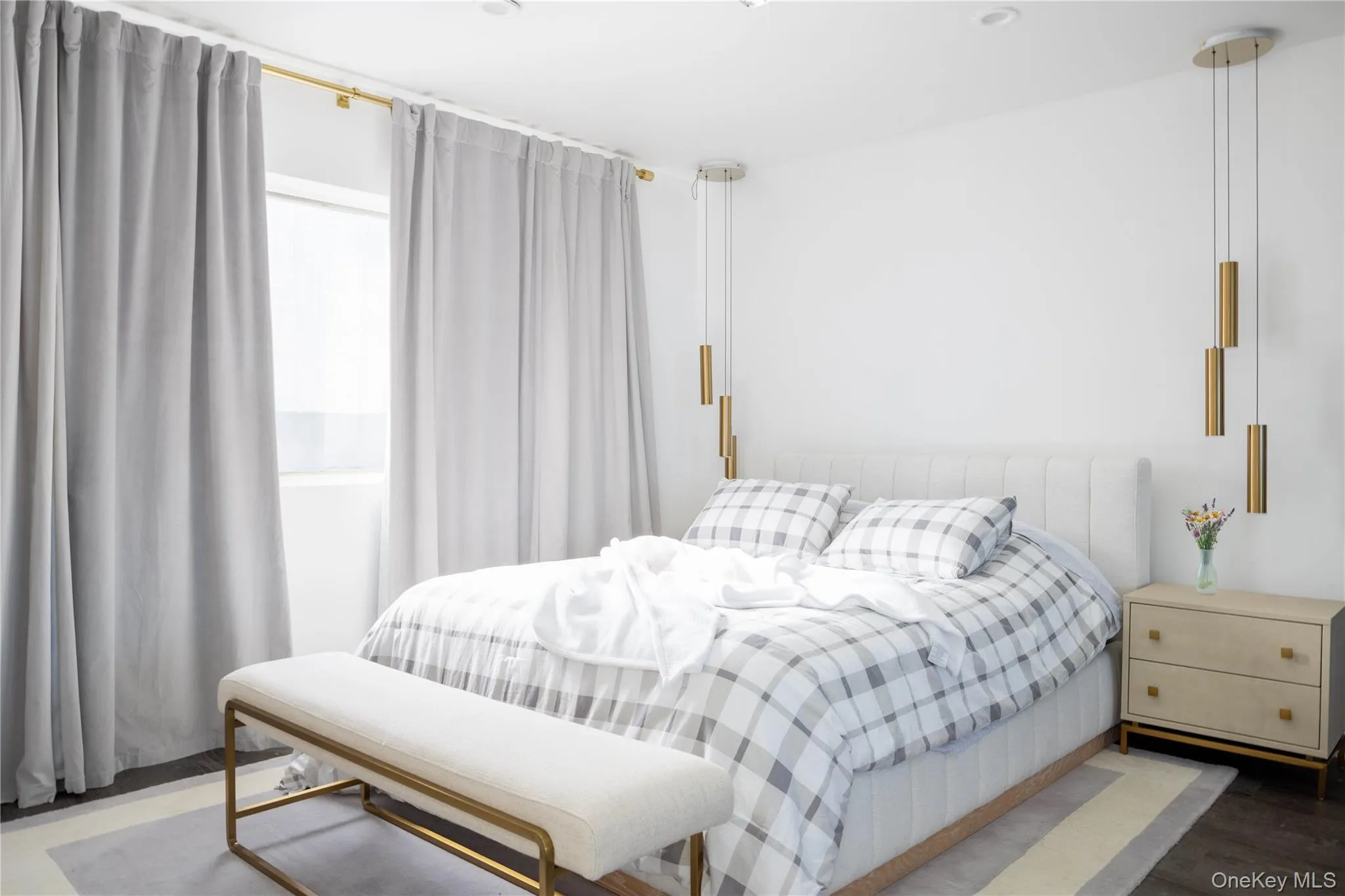 Bedroom featuring wood finished floors Bedroom featuring wood finished floors