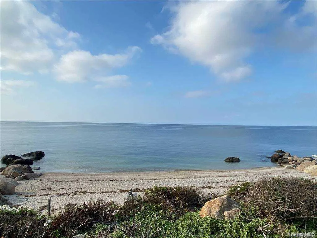 Water view with a view of the beach Water view with a view of the beach