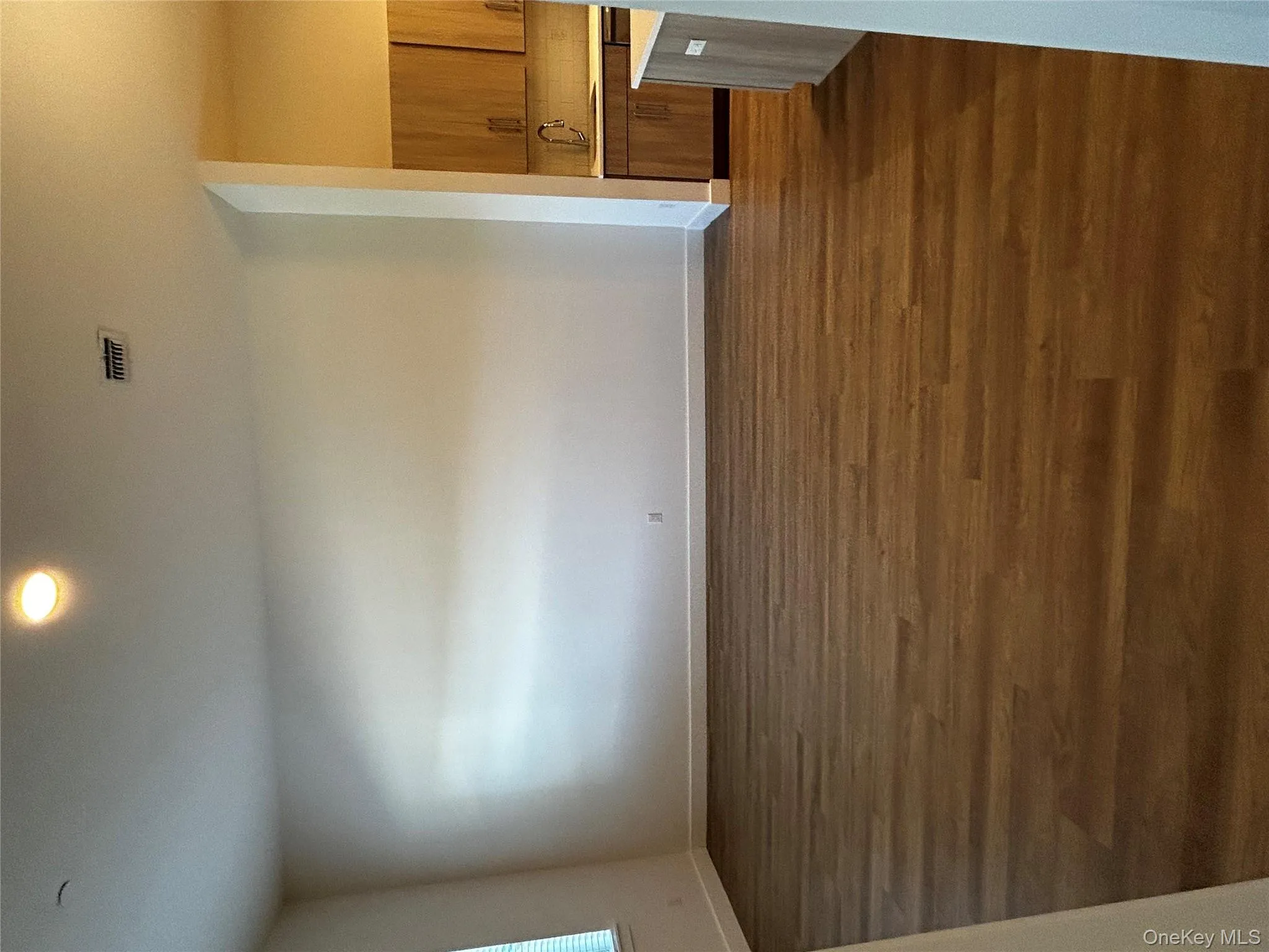 Unfurnished dining area featuring visible vents, baseboards, recessed lighting, a sink, and dark wood finished floors Unfurnished dining area featuring visible vents, baseboards, recessed lighting, a sink, and dark wood finished floors