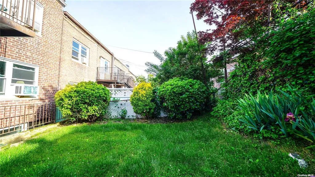 View of yard featuring fence View of yard featuring fence