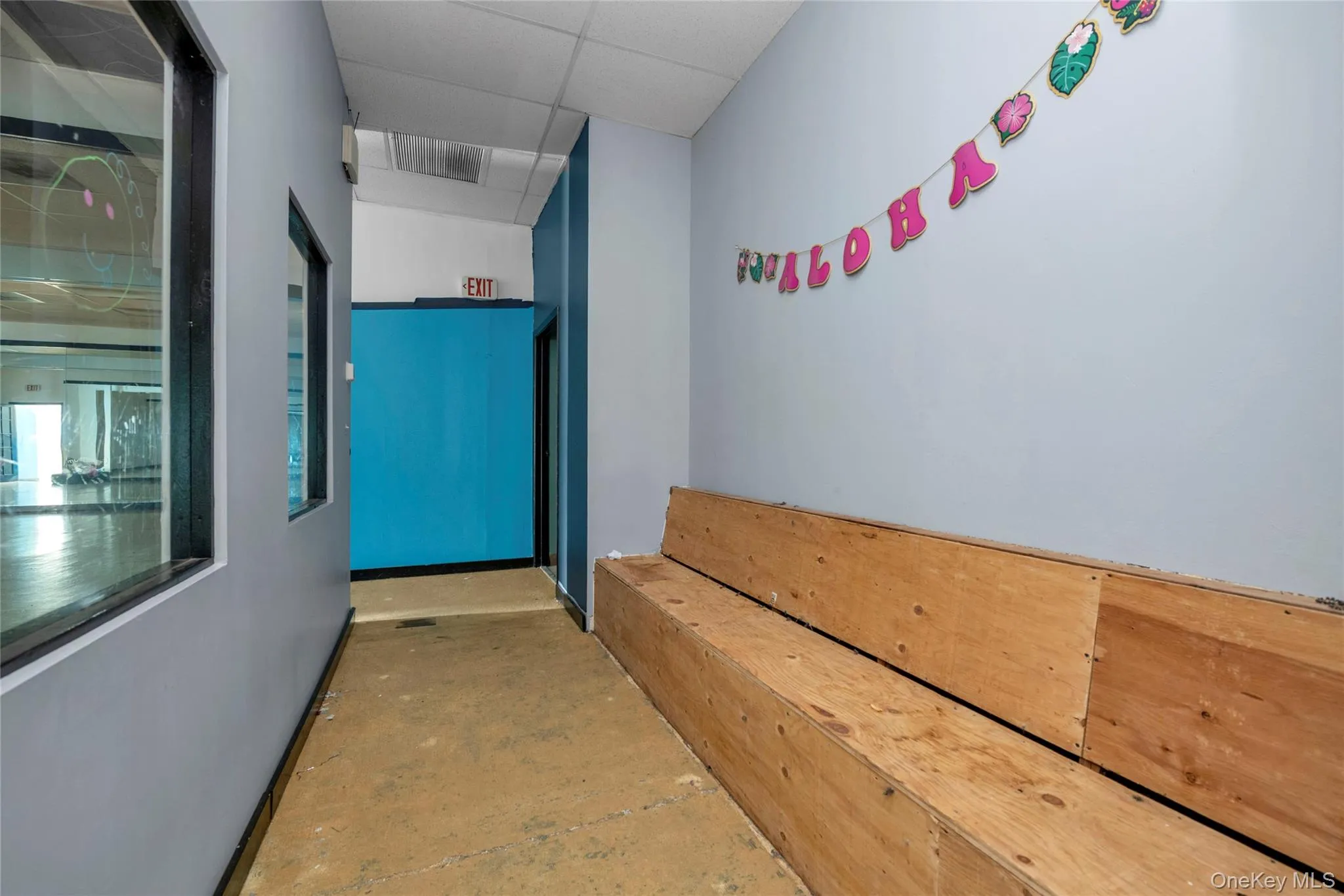 Corridor with a drop ceiling Corridor with a drop ceiling