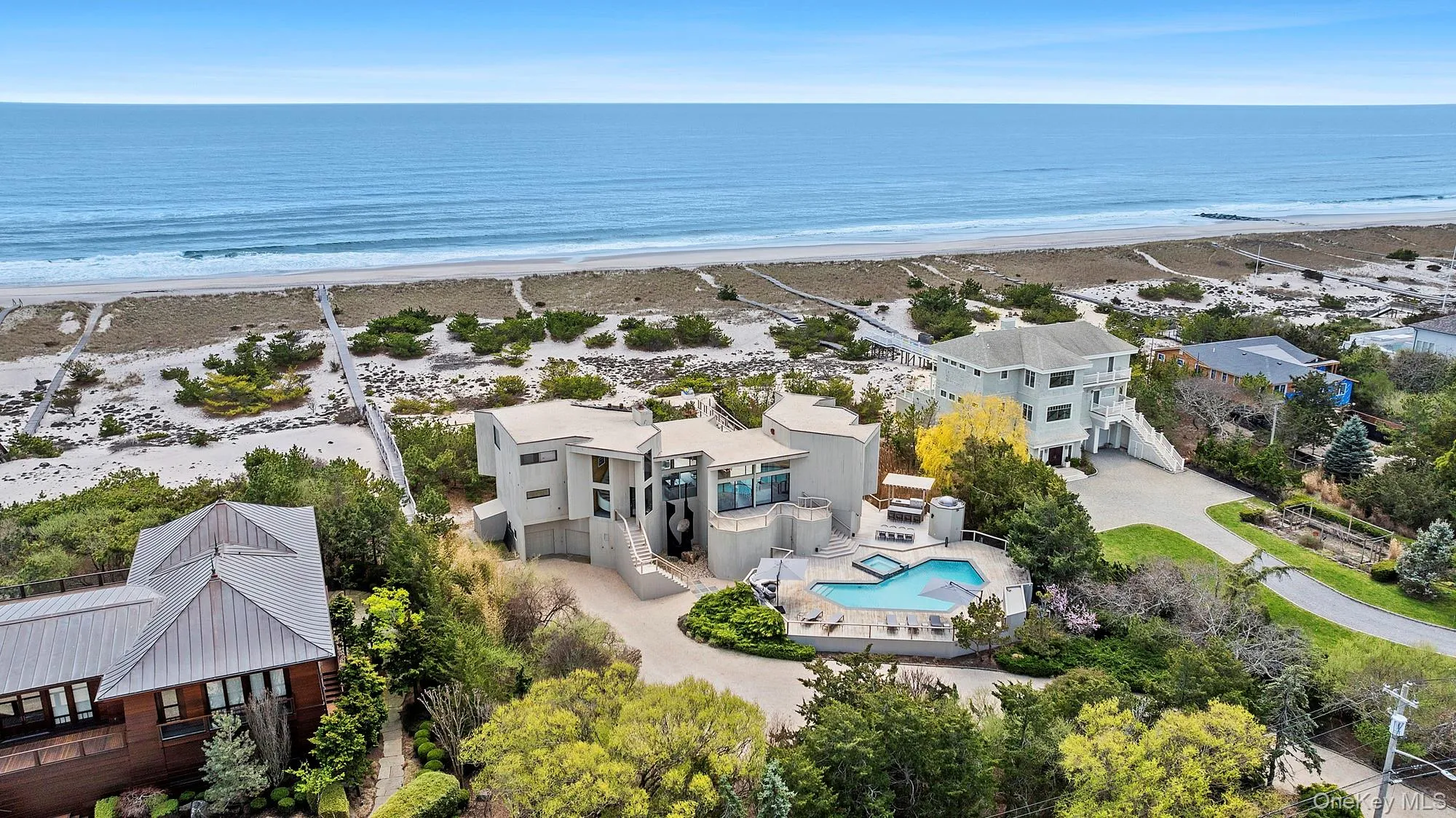 Bird's eye view with a view of the beach and a water view