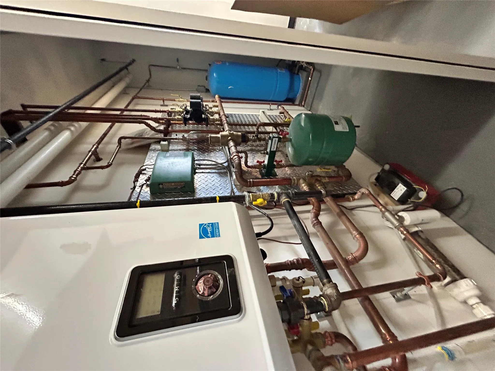 Utilities featuring water heater Utilities featuring water heater