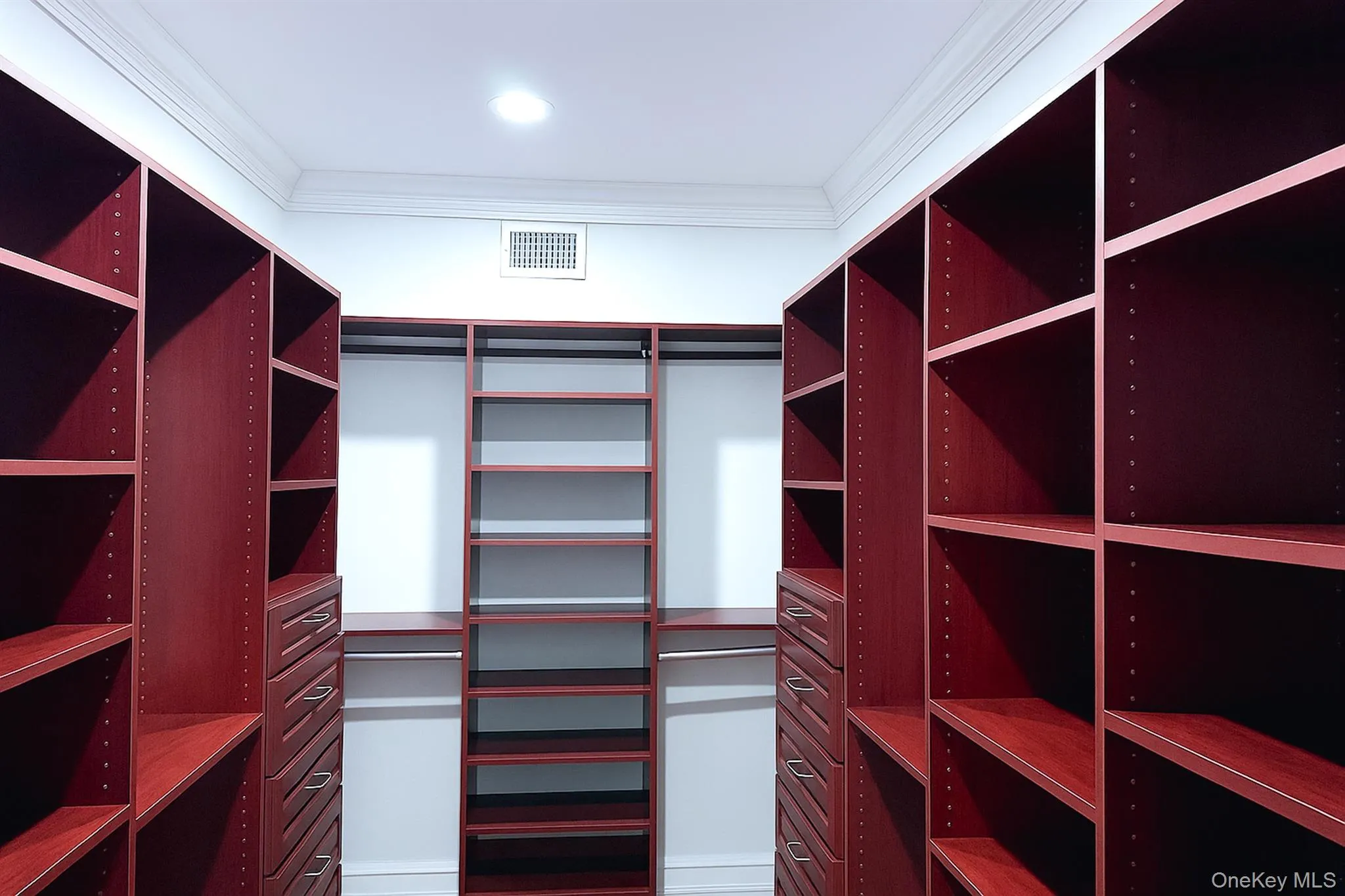 Primary walk in closet Primary walk in closet