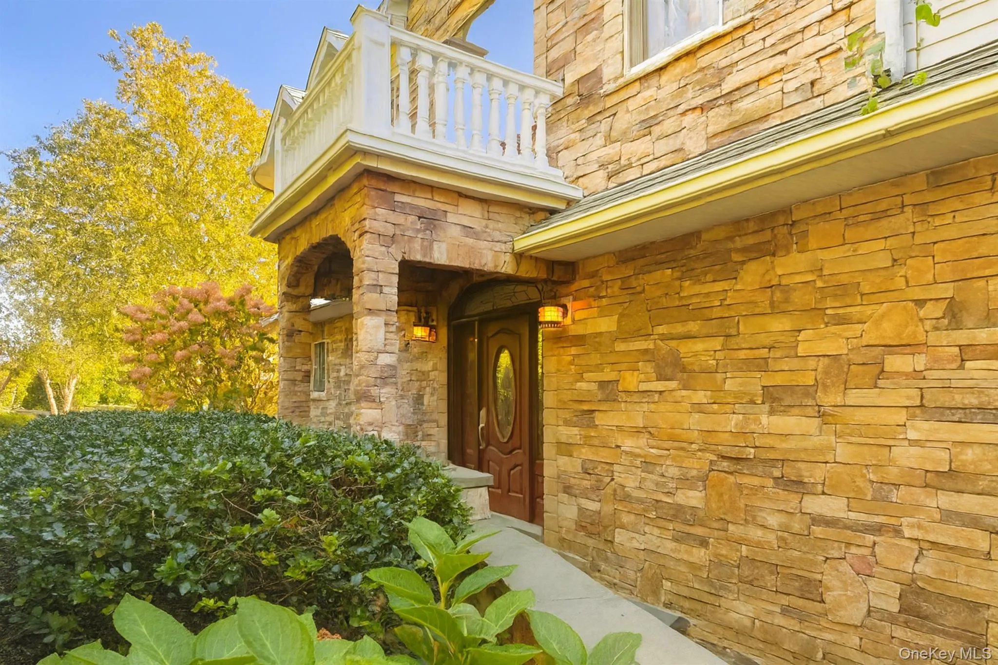 Property entrance featuring stone siding Property entrance featuring stone siding