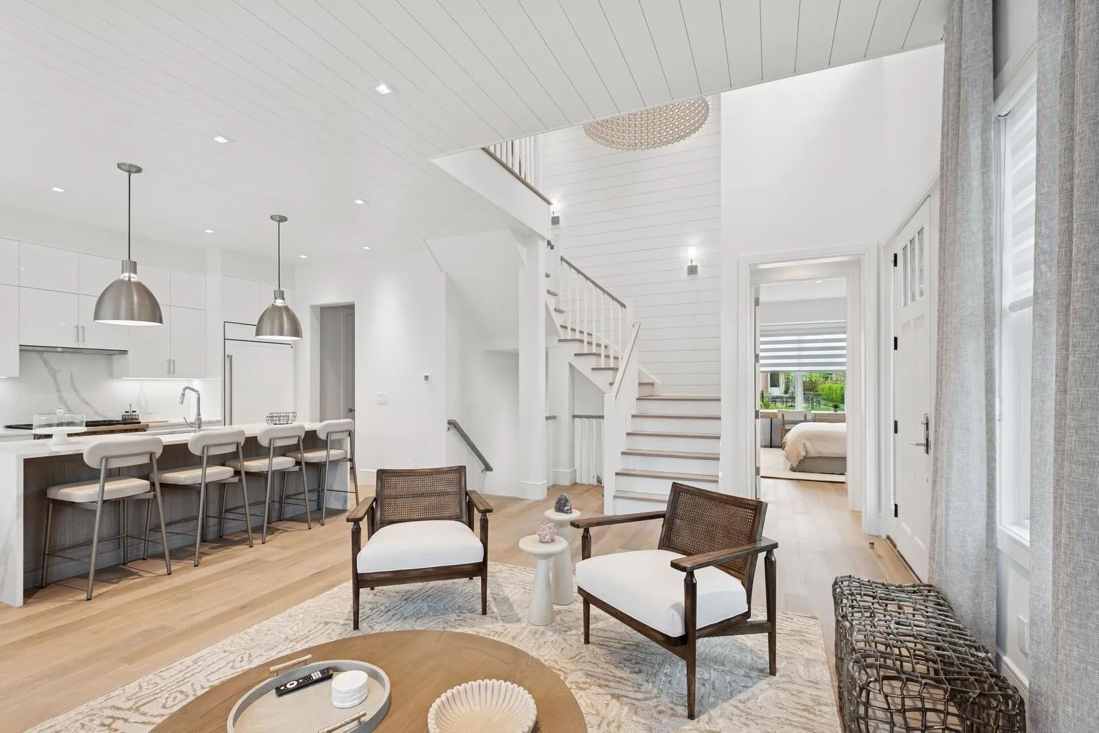 Sitting room featuring light wood-style flooring, stairway, wood ceiling, and recessed lighting Sitting room featuring light wood-style flooring, stairway, wood ceiling, and recessed lighting