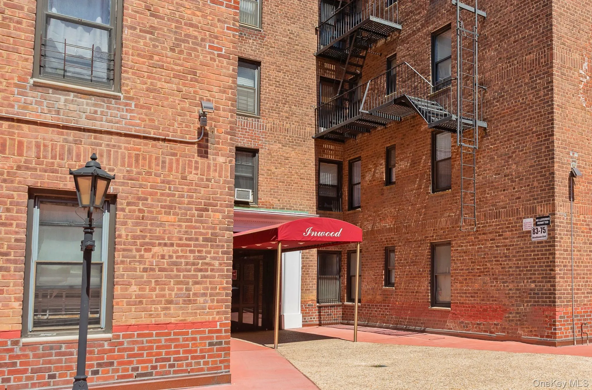 View of apartment building / complex featuring cooling unit View of apartment building / complex featuring cooling unit
