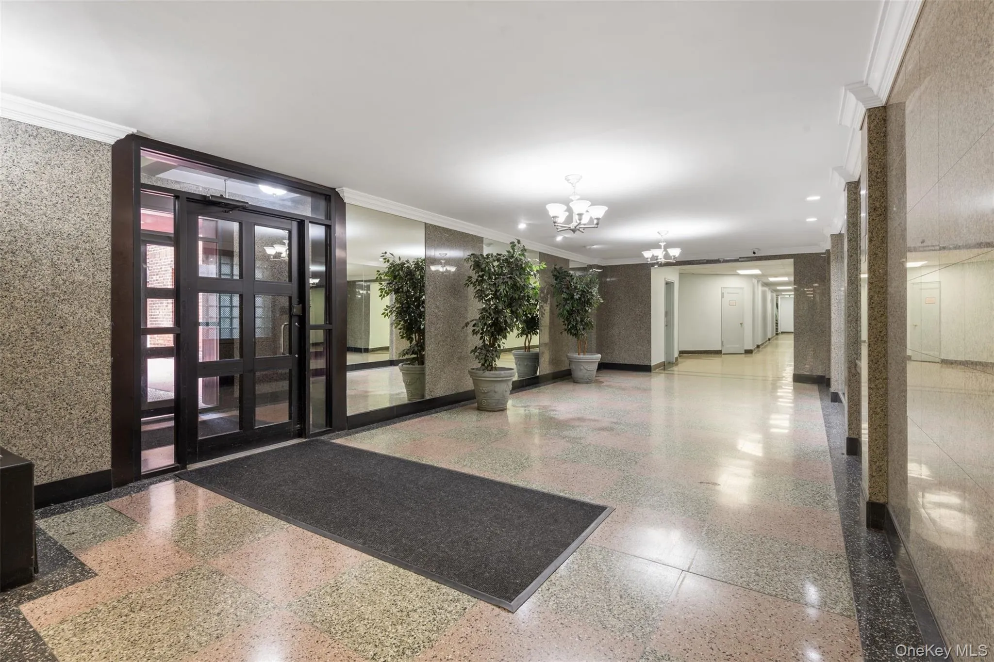Common area featuring ornamental molding Common area featuring ornamental molding