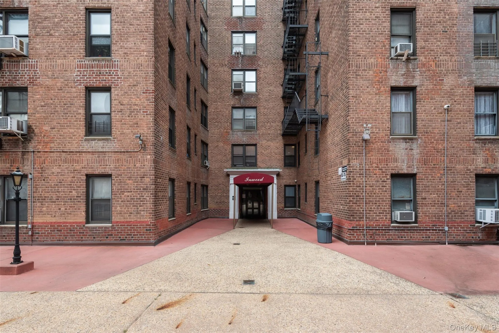 View of apartment building / complex with cooling unit View of apartment building / complex with cooling unit