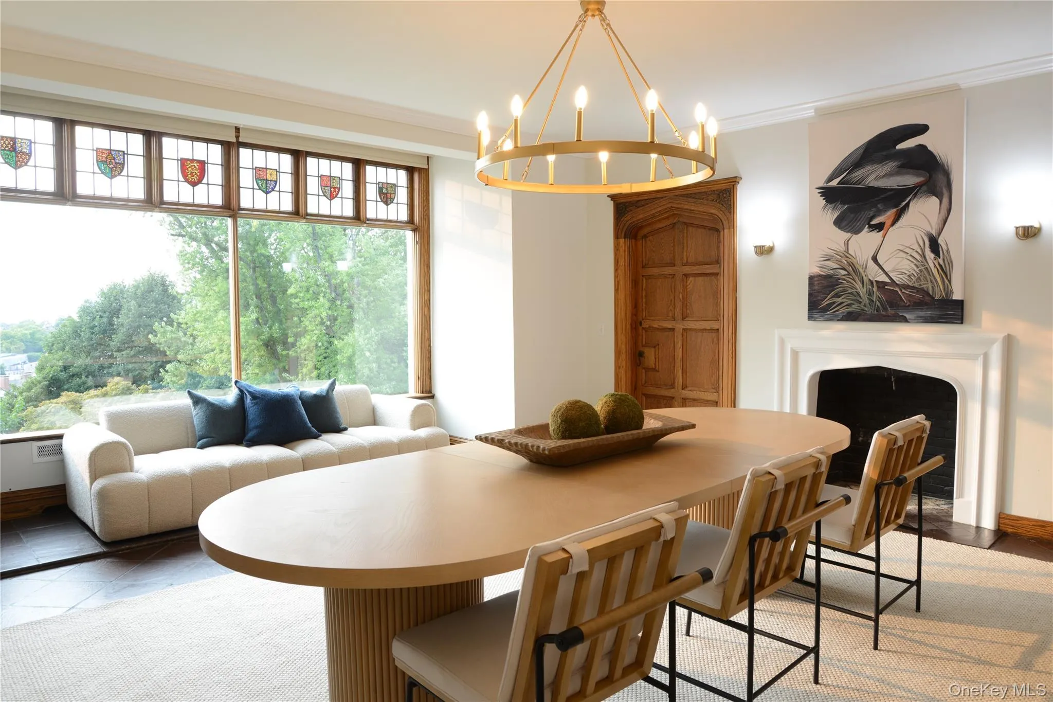 Dining area featuring crown molding and a chandelier Dining area featuring crown molding and a chandelier