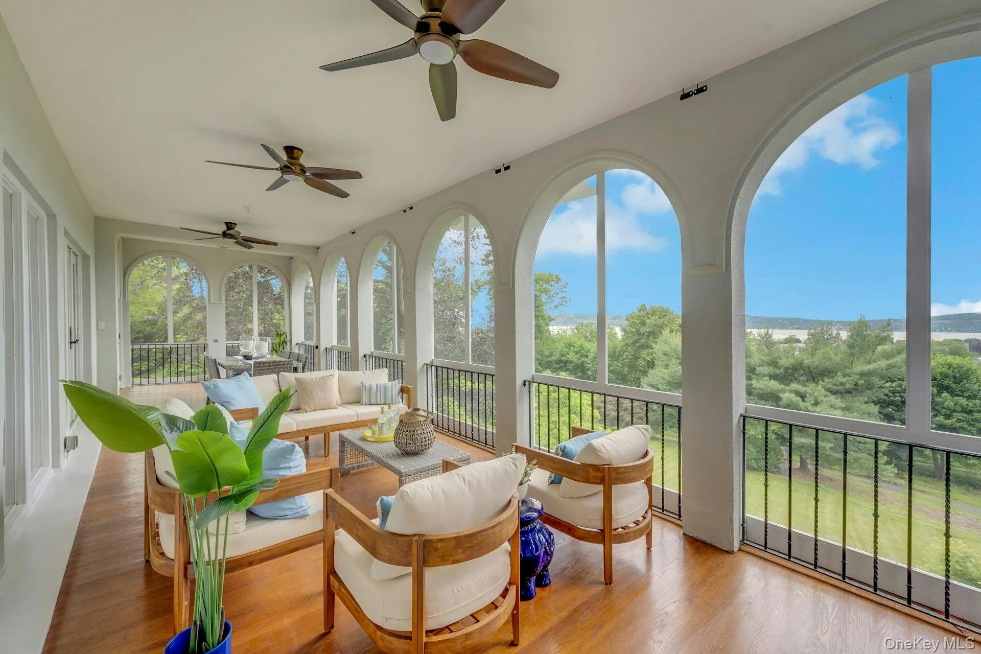 Screened in porch (sunroom) with healthy amount of natural light and wood finished floors & spectacular Hudson River views Screened in porch (sunroom) with healthy amount of natural light and wood finished floors & spectacular Hudson River views