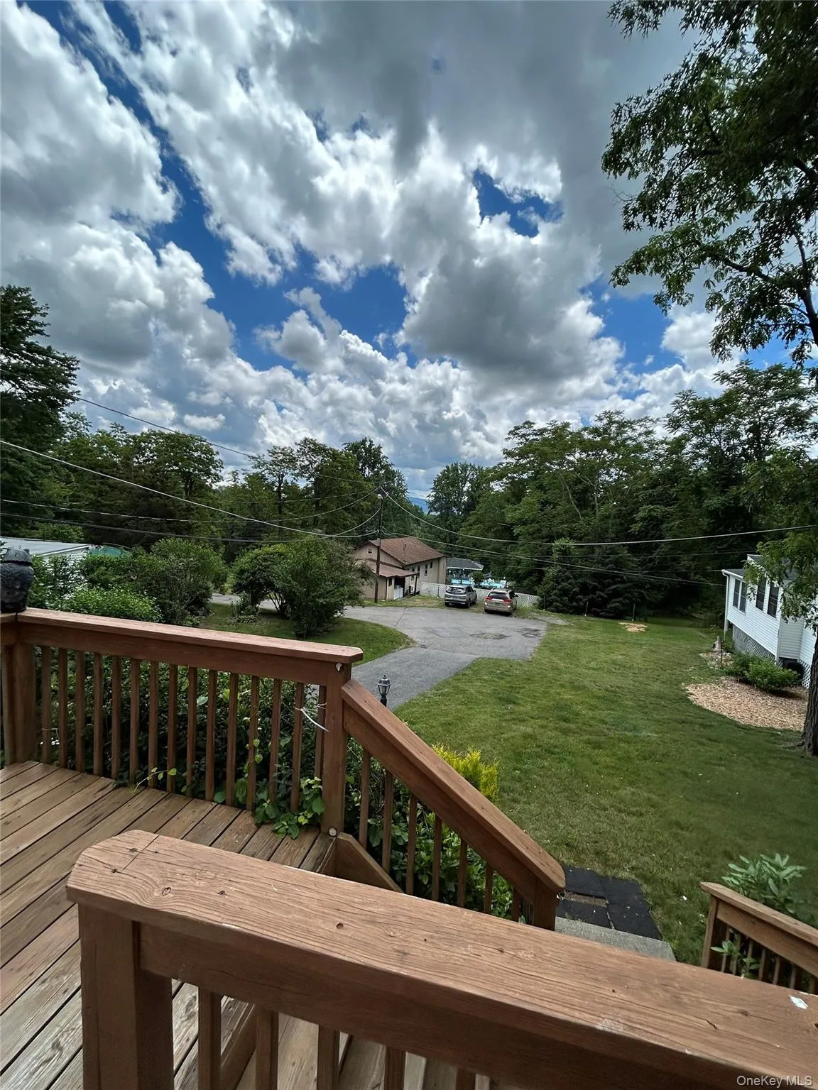 Deck featuring a yard Deck featuring a yard