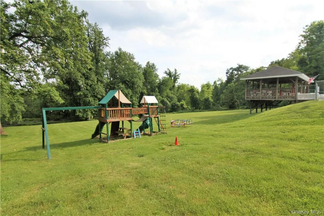 View of yard with a playground and a gazebo View of yard with a playground and a gazebo