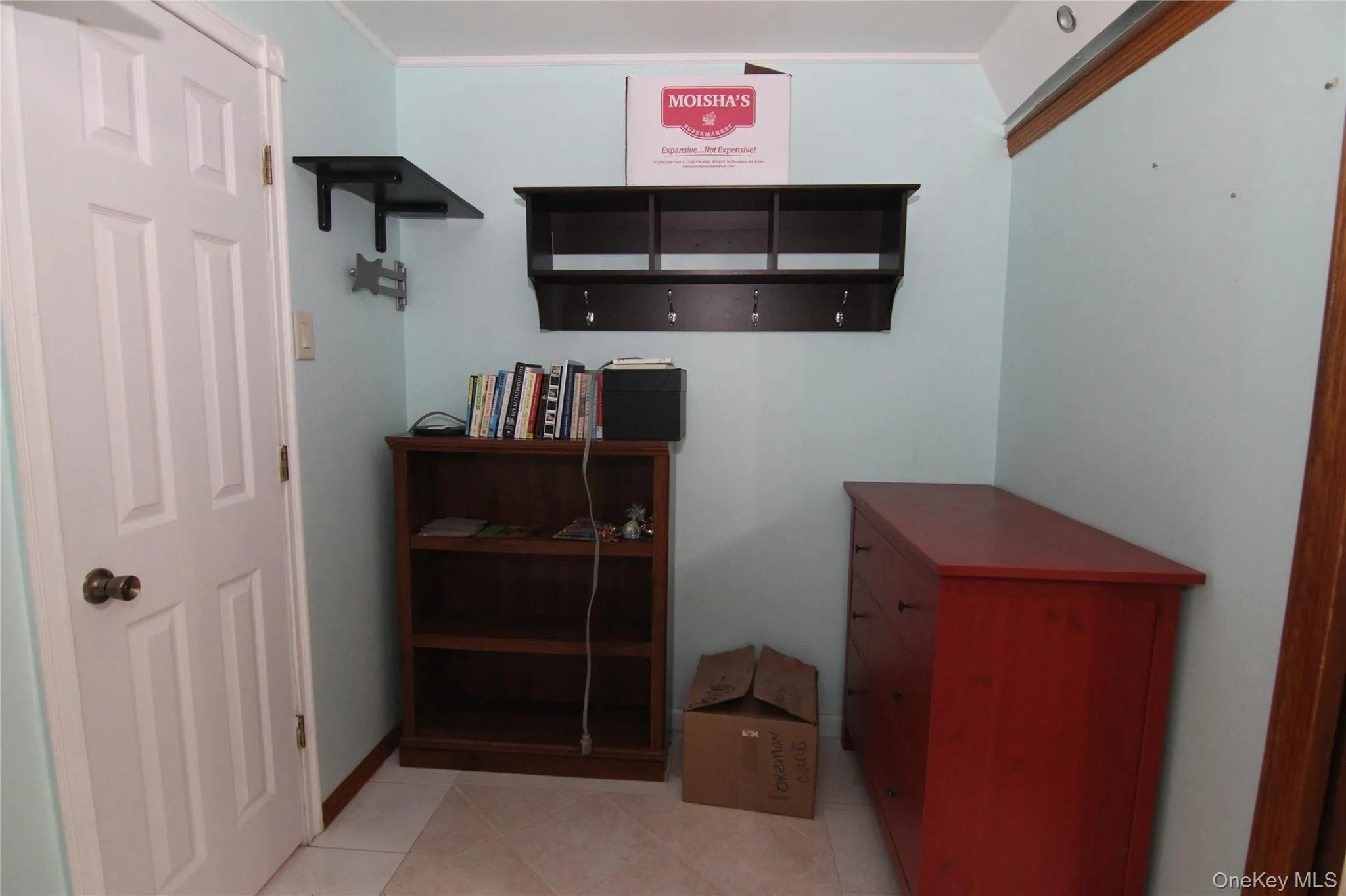 Mudroom featuring light tile patterned floors Mudroom featuring light tile patterned floors