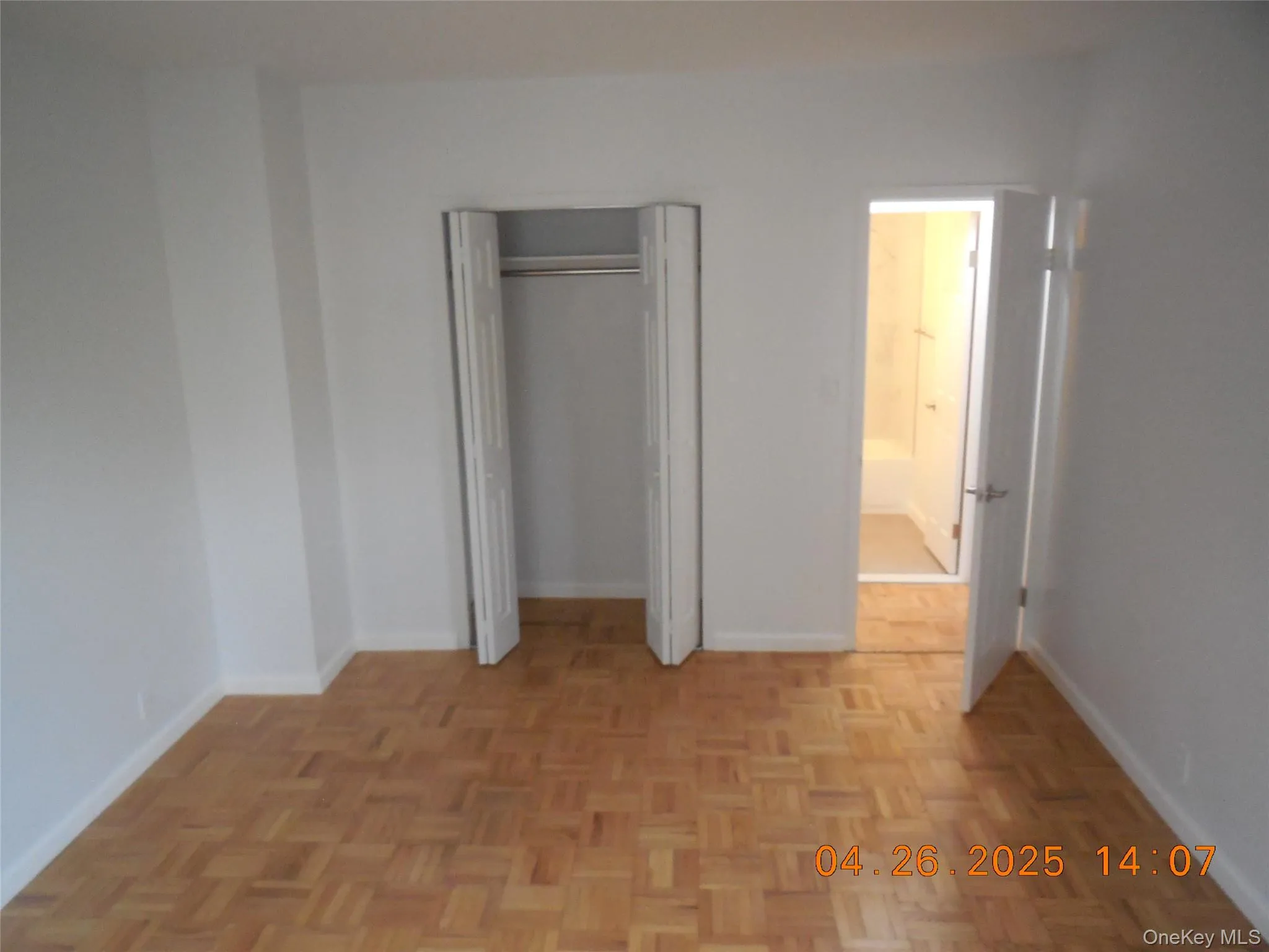Unfurnished bedroom featuring baseboards and a closet Unfurnished bedroom featuring baseboards and a closet