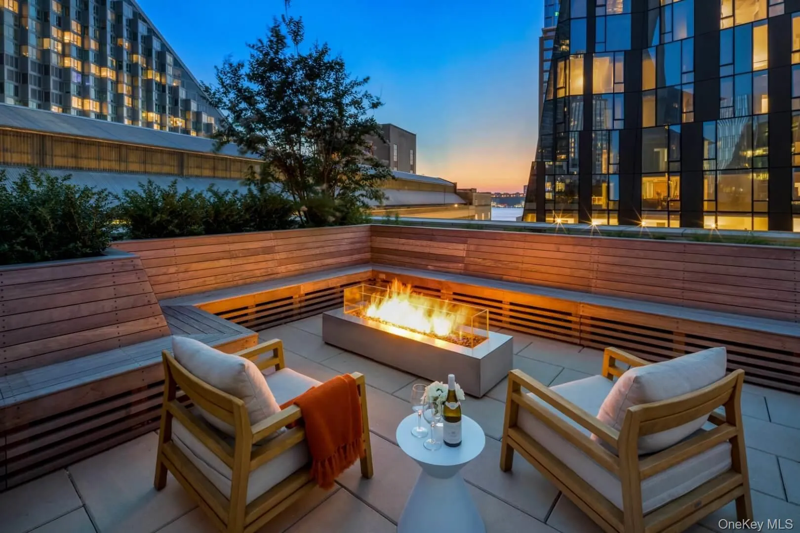 View of patio with an outdoor living space with a fire pit View of patio with an outdoor living space with a fire pit
