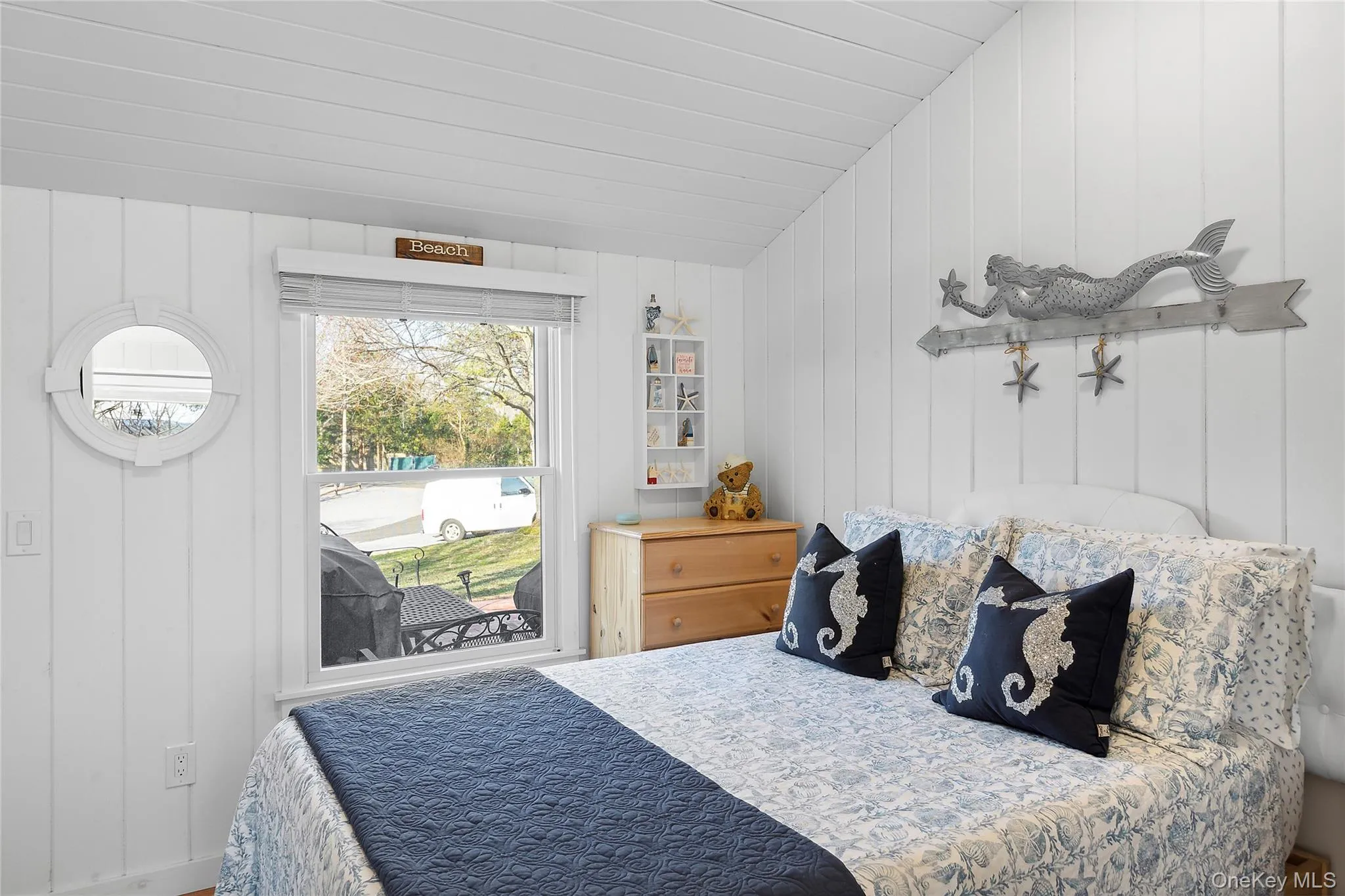 Bedroom featuring lofted ceiling Bedroom featuring lofted ceiling