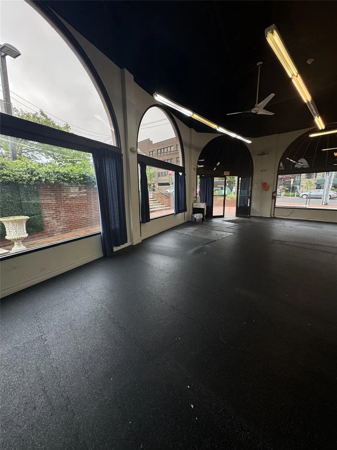 Empty room with a ceiling fan Empty room with a ceiling fan