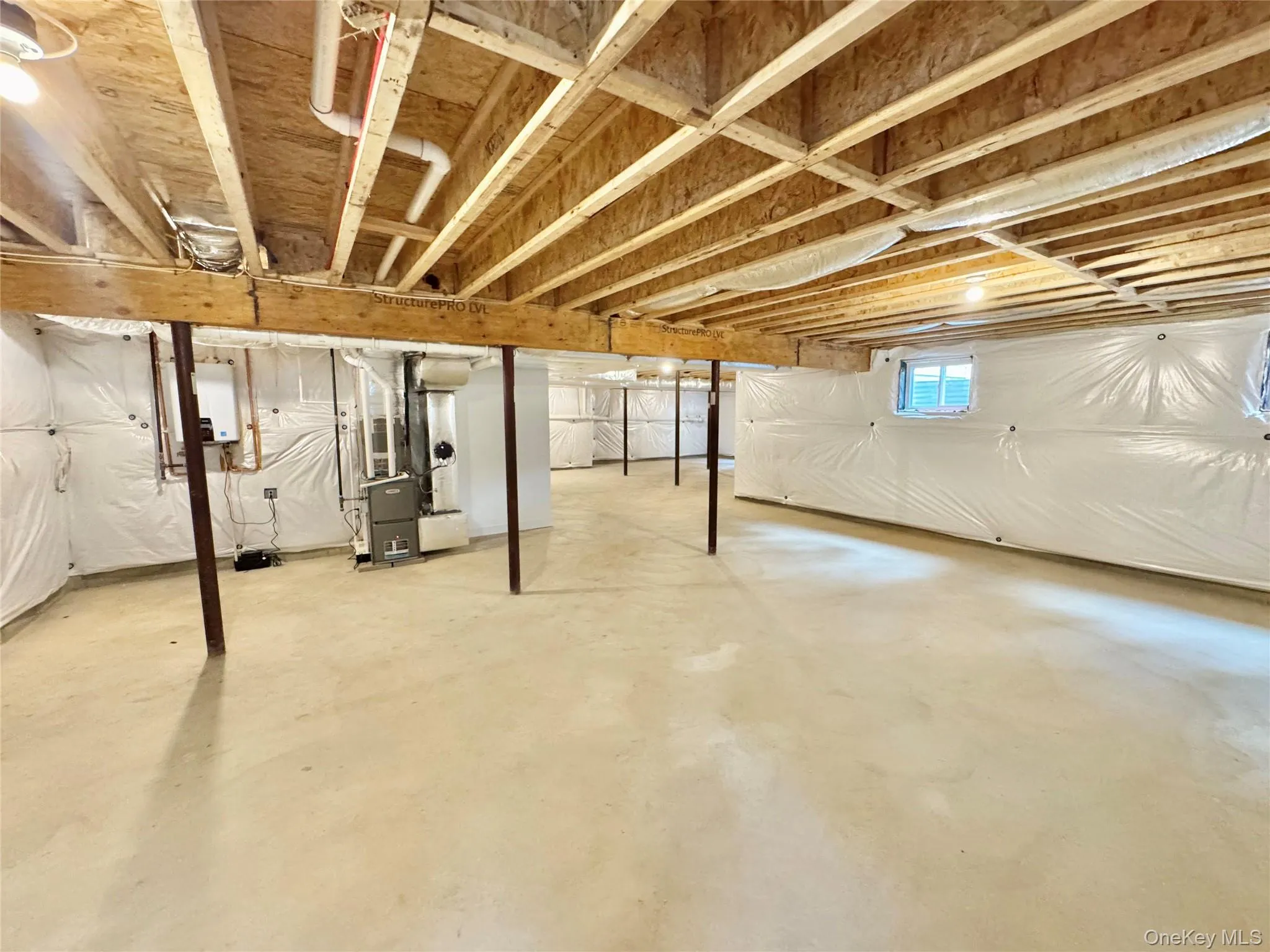 Below grade area with heating unit Below grade area with heating unit