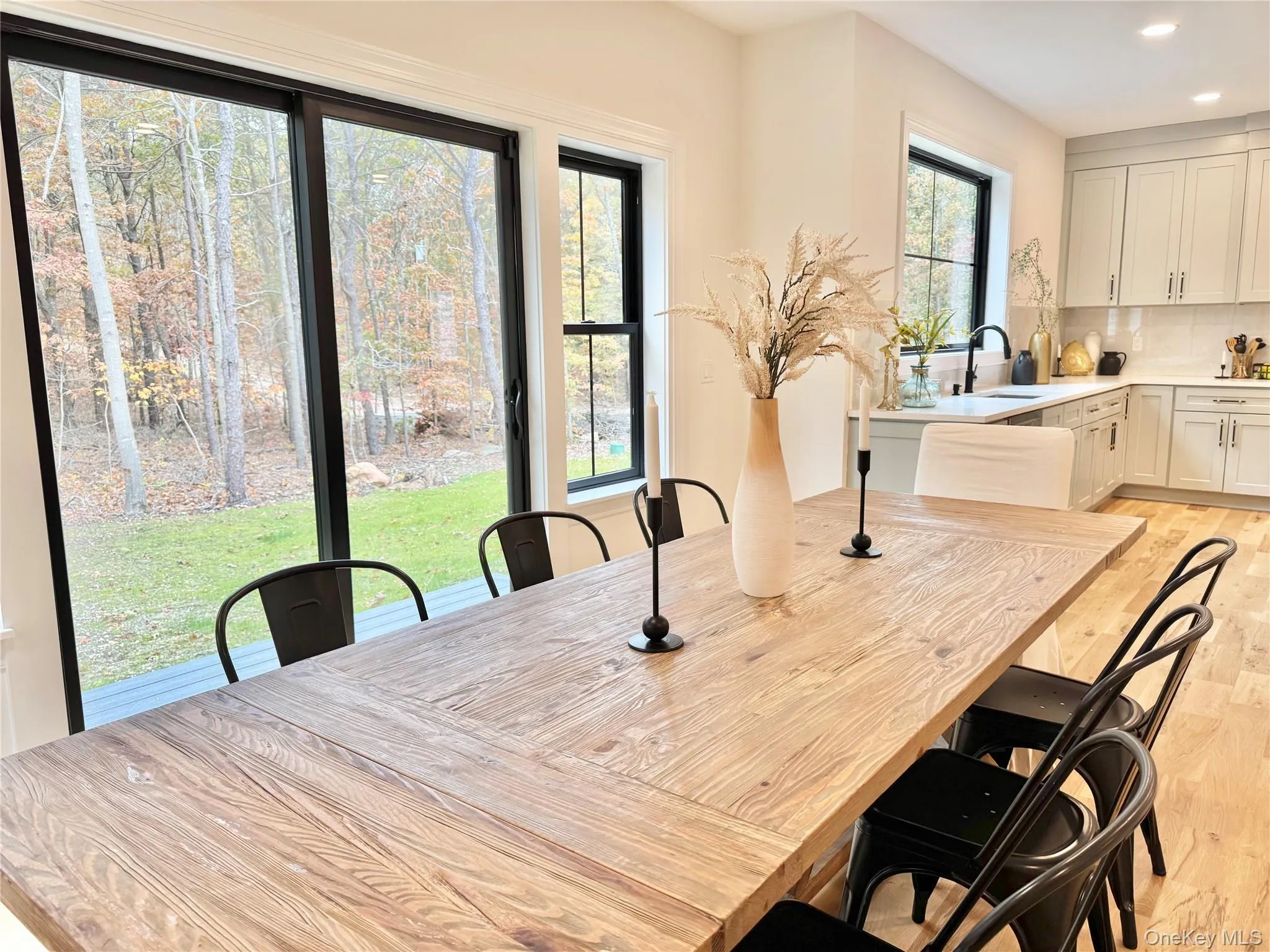 Dining area featuring light wood finished floors and recessed lighting Dining area featuring light wood finished floors and recessed lighting