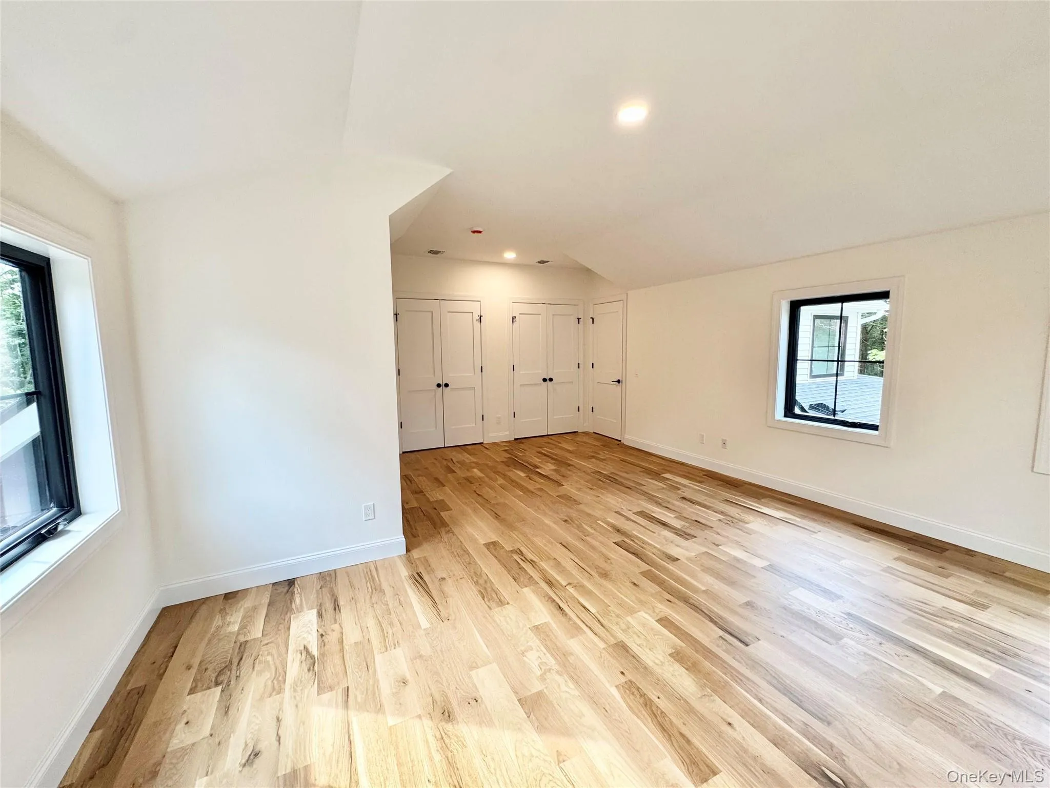Additional living space featuring recessed lighting and light wood-style floors Additional living space featuring recessed lighting and light wood-style floors