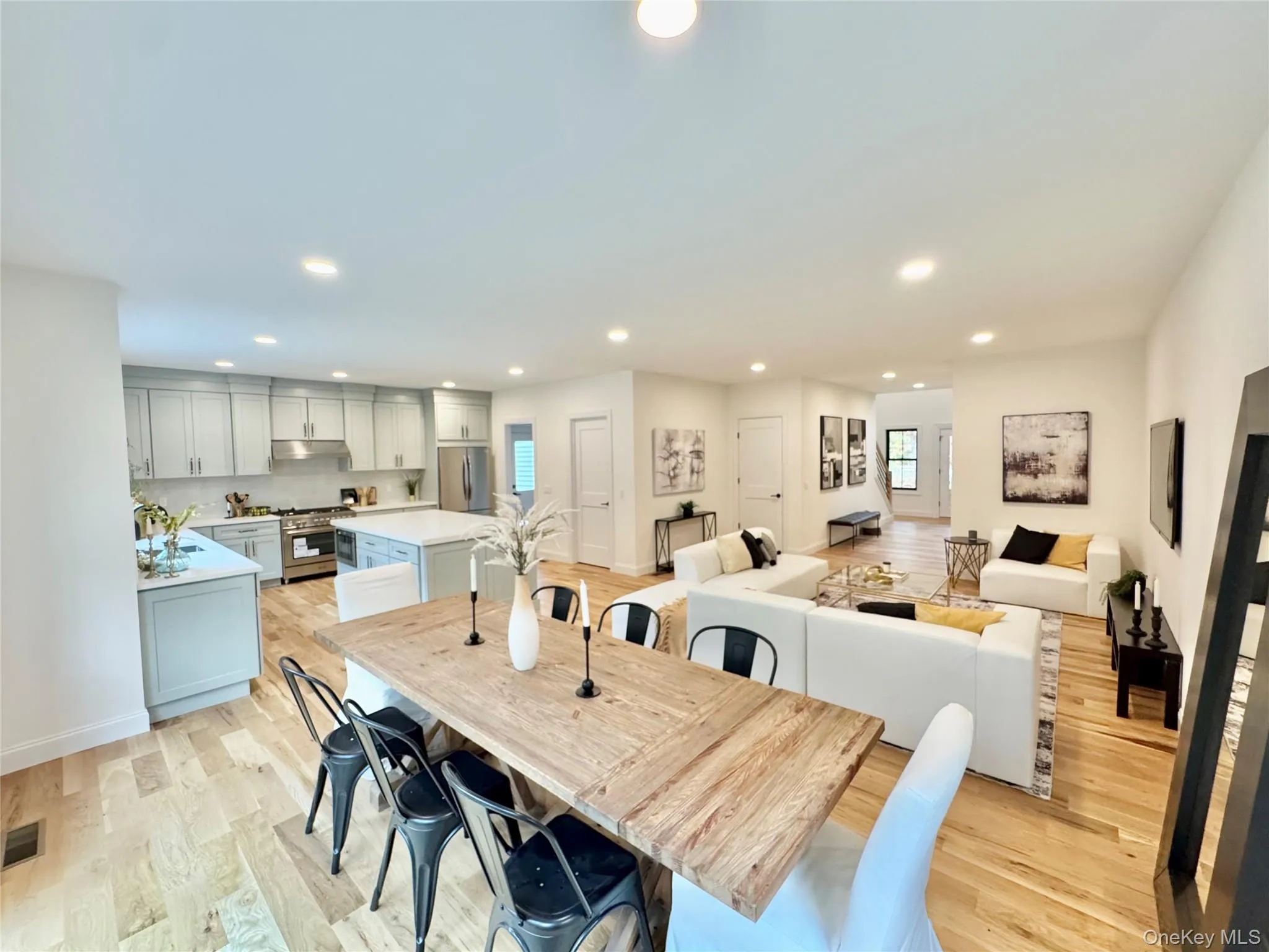 Dining space featuring recessed lighting and light wood-style flooring Dining space featuring recessed lighting and light wood-style flooring