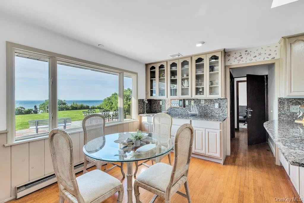 Eat-in kitchen with water views. Office/bedroom beyond Eat-in kitchen with water views. Office/bedroom beyond