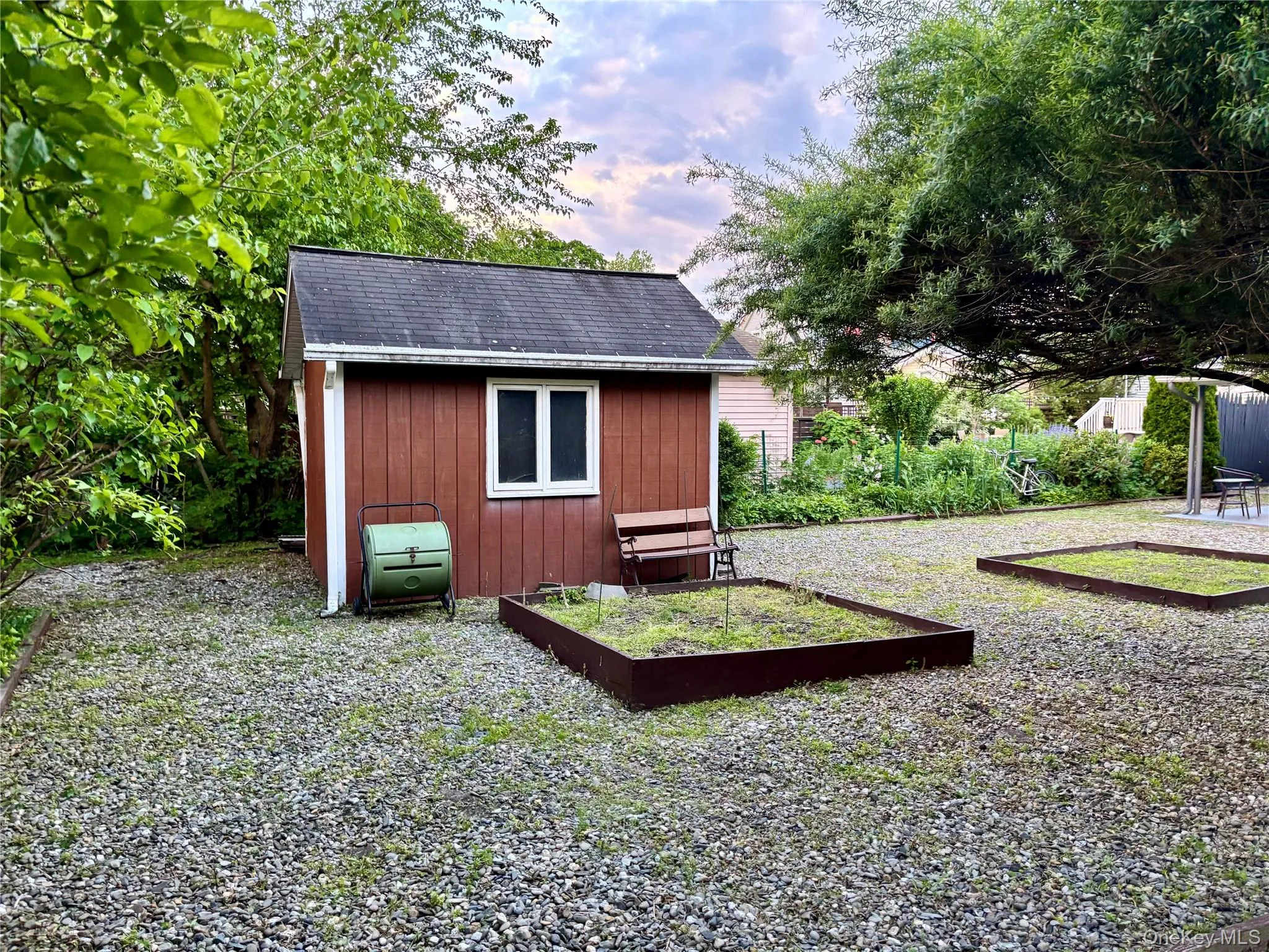 View of shed featuring a garden View of shed featuring a garden