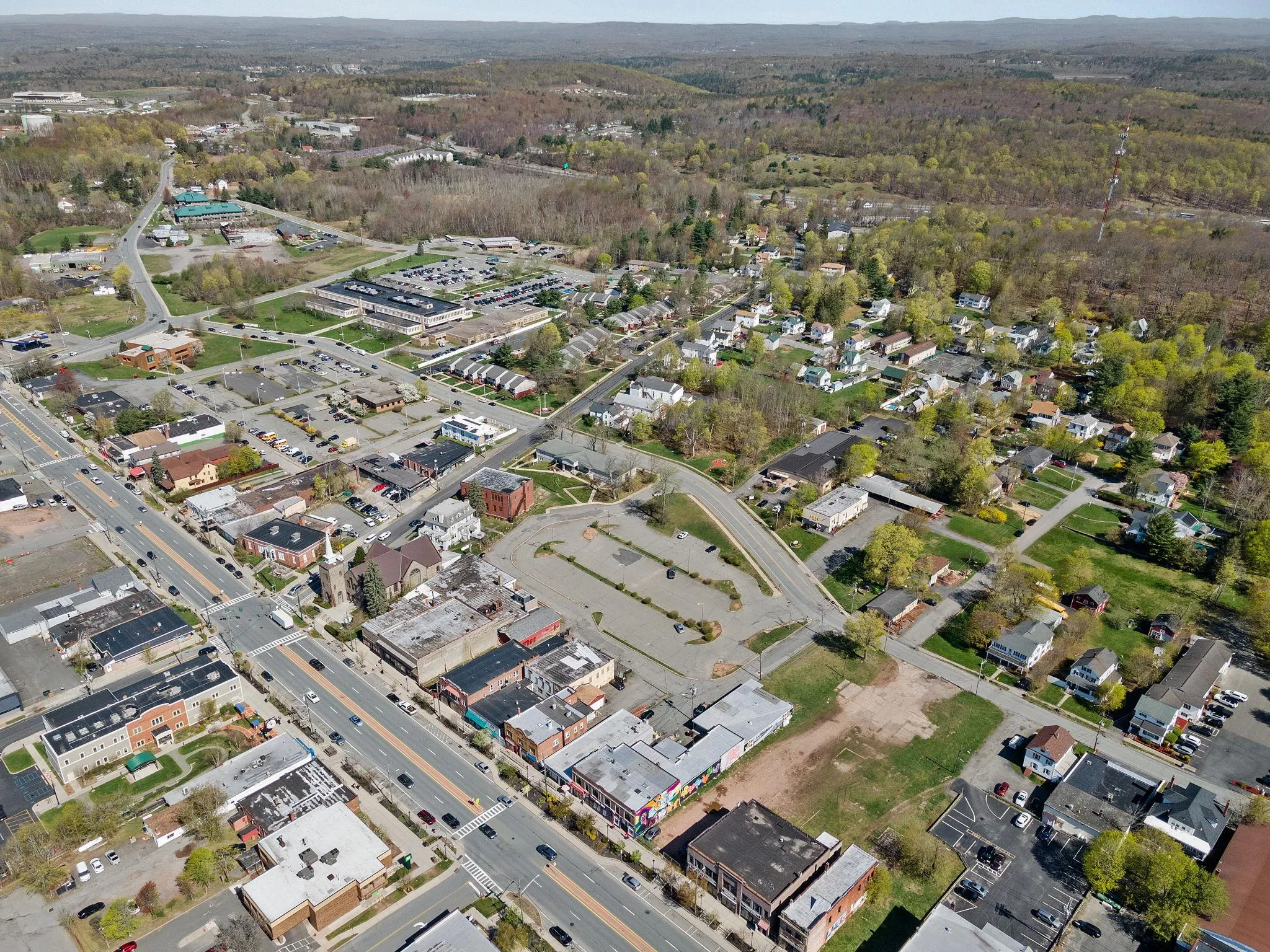 Aerial view of property's location featuring a heavily wooded area Aerial view of property's location featuring a heavily wooded area