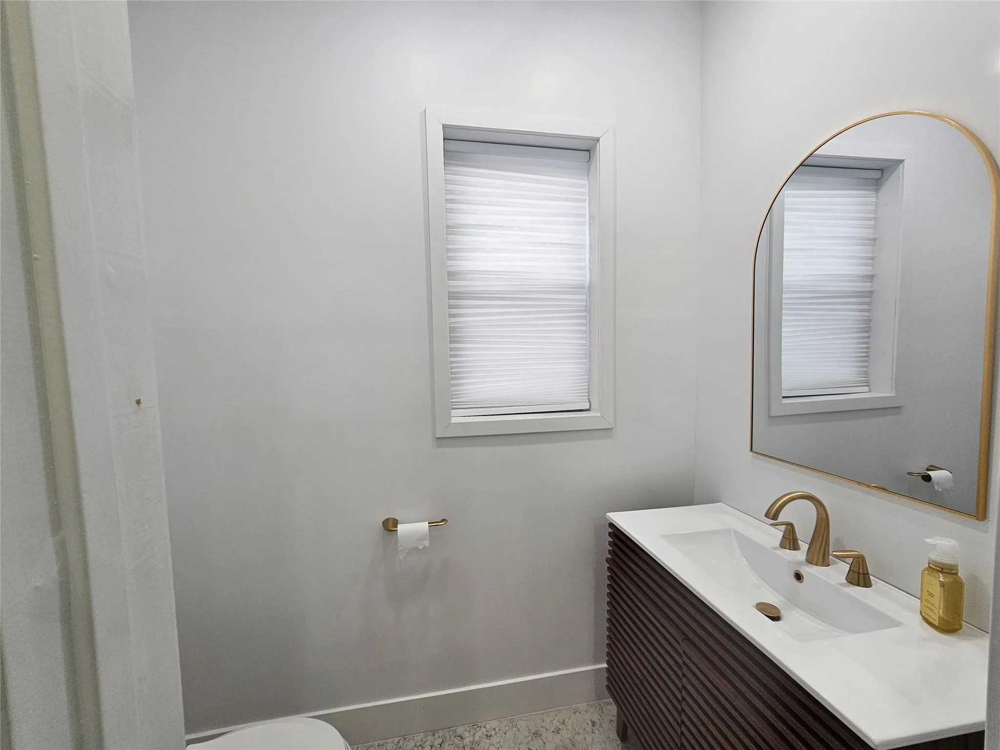 Bathroom with baseboards and vanity Bathroom with baseboards and vanity