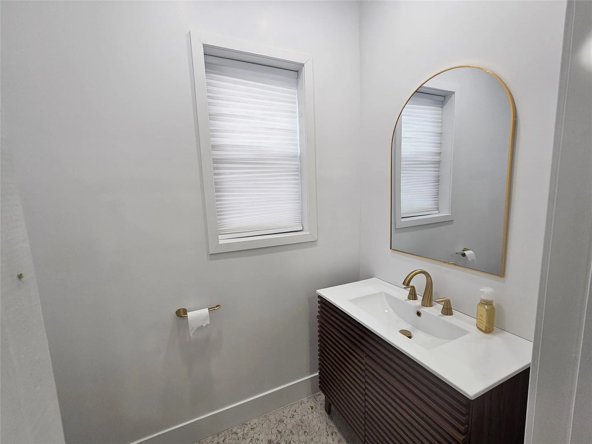 Bathroom with baseboards and vanity Bathroom with baseboards and vanity