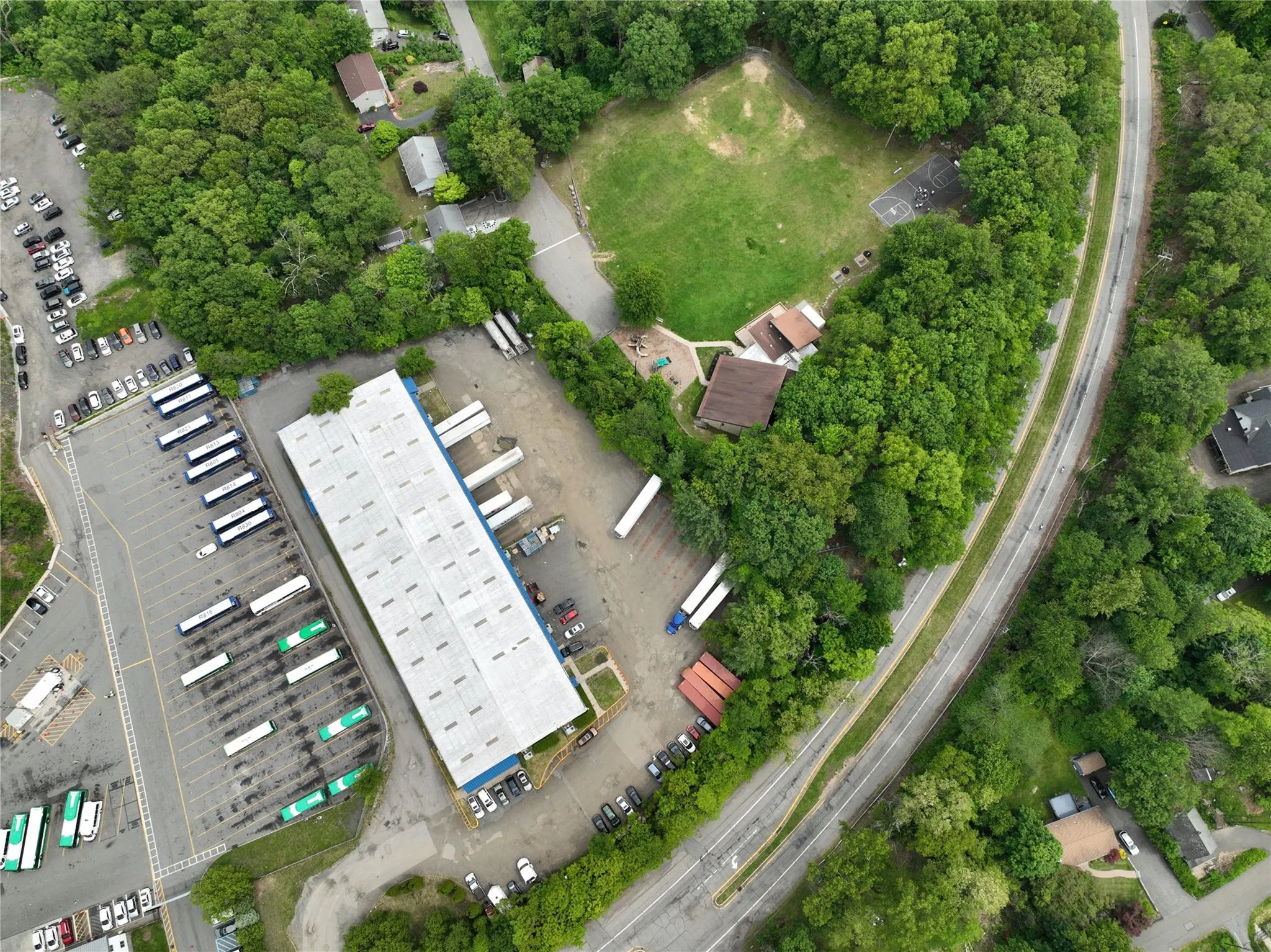 Aerial overview of property's location featuring a tree filled landscape Aerial overview of property's location featuring a tree filled landscape