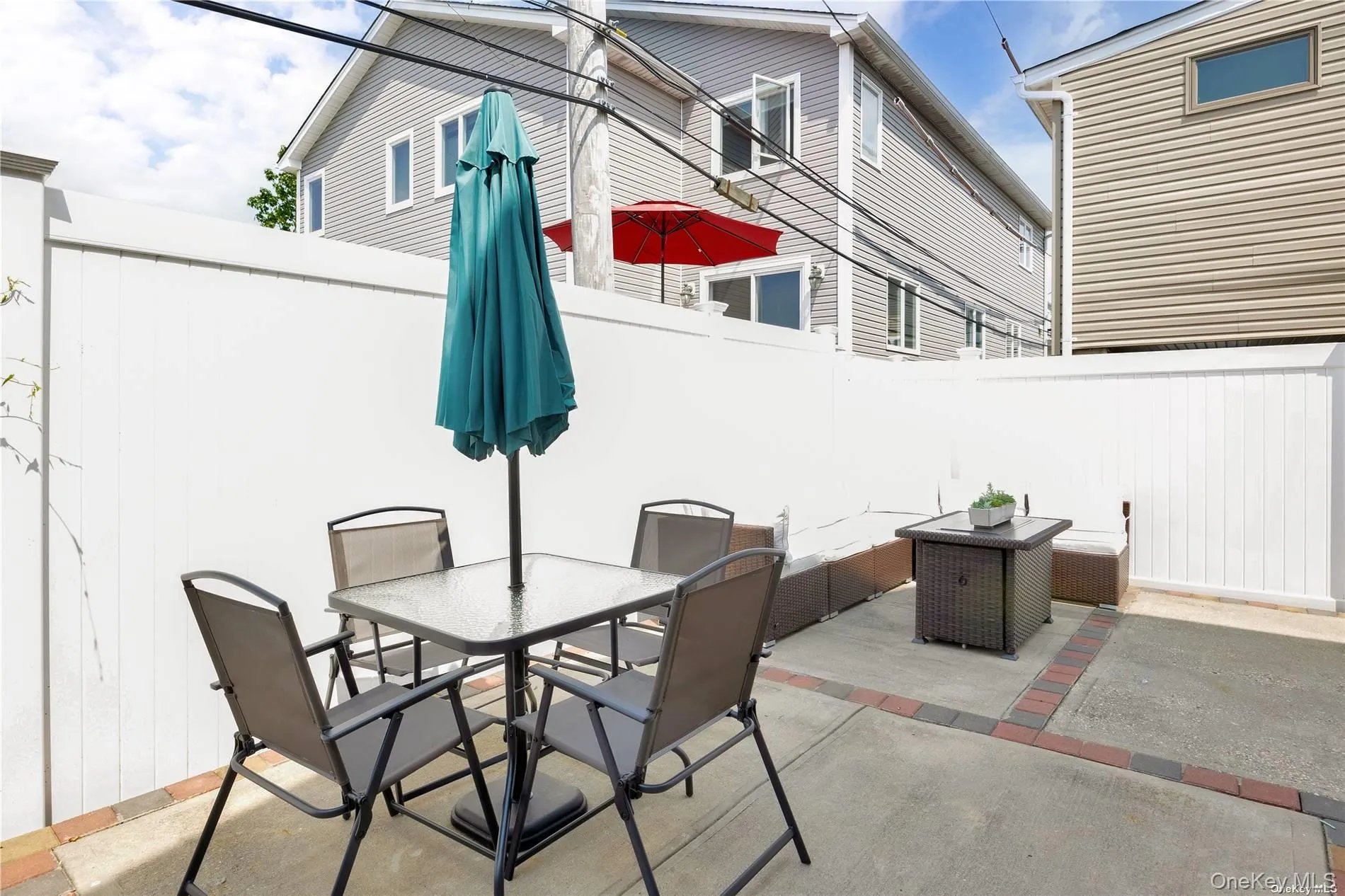 View of patio featuring outdoor dining space and a fenced backyard View of patio featuring outdoor dining space and a fenced backyard