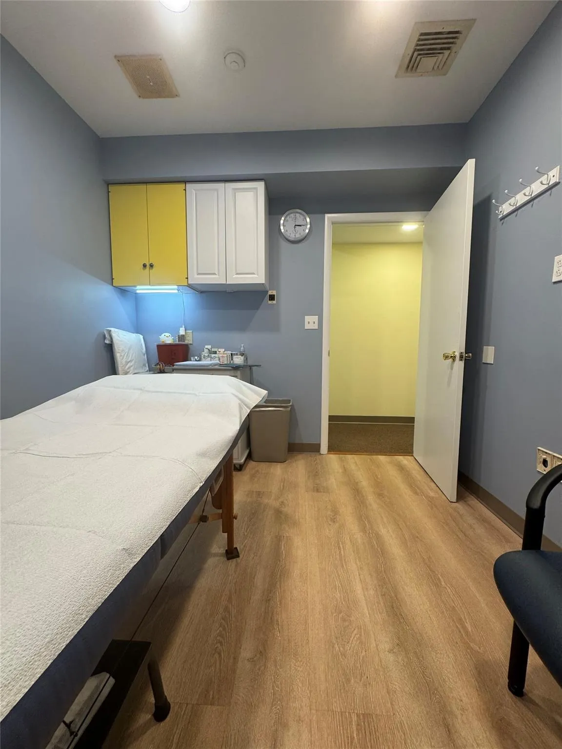 Bedroom with light wood-style floors and baseboards Bedroom with light wood-style floors and baseboards