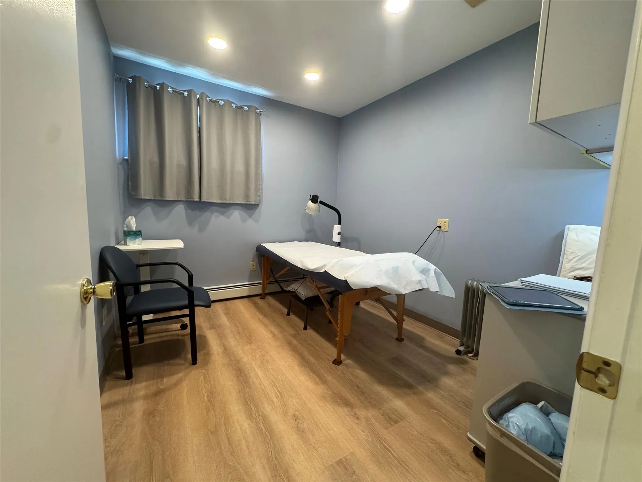 Office with light wood finished floors, baseboards, and recessed lighting Office with light wood finished floors, baseboards, and recessed lighting