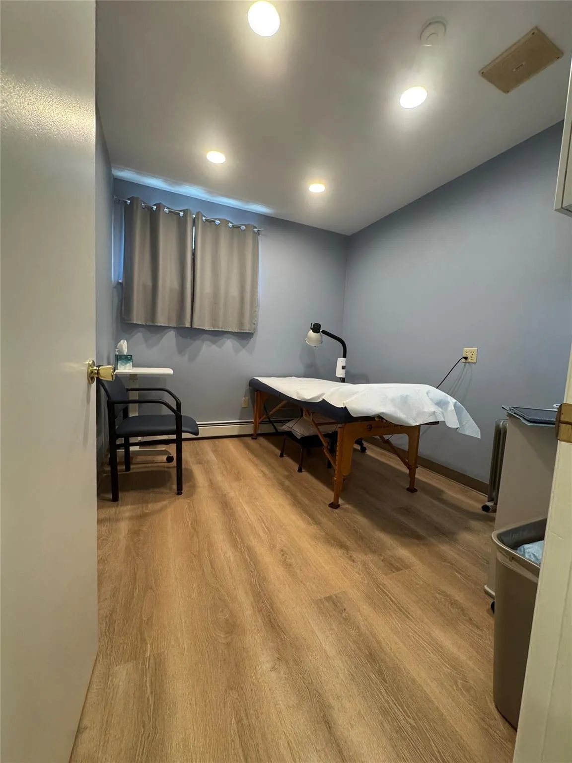 Office with wood finished floors, baseboards, and recessed lighting Office with wood finished floors, baseboards, and recessed lighting