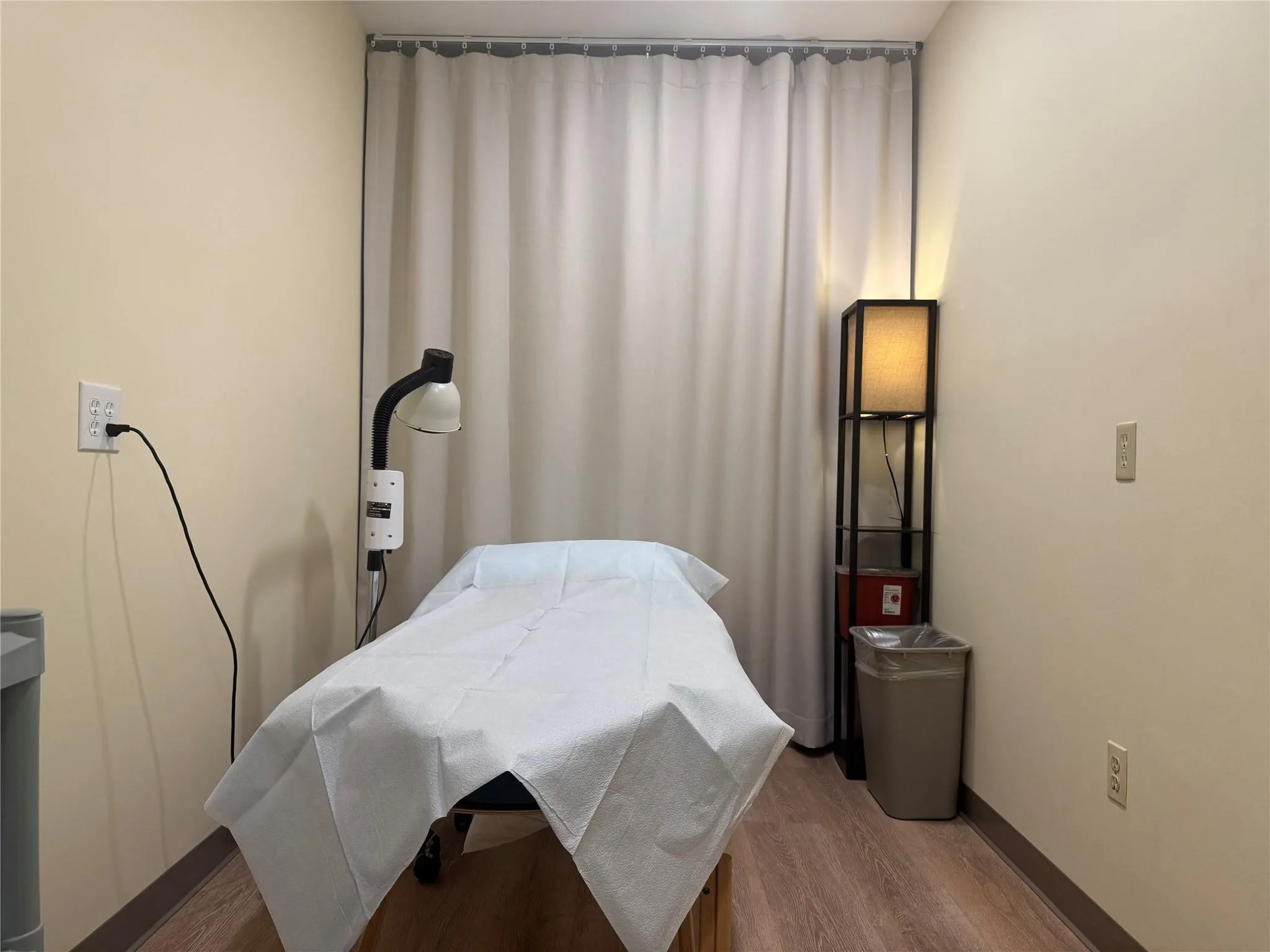 Bedroom with wood finished floors and baseboards Bedroom with wood finished floors and baseboards