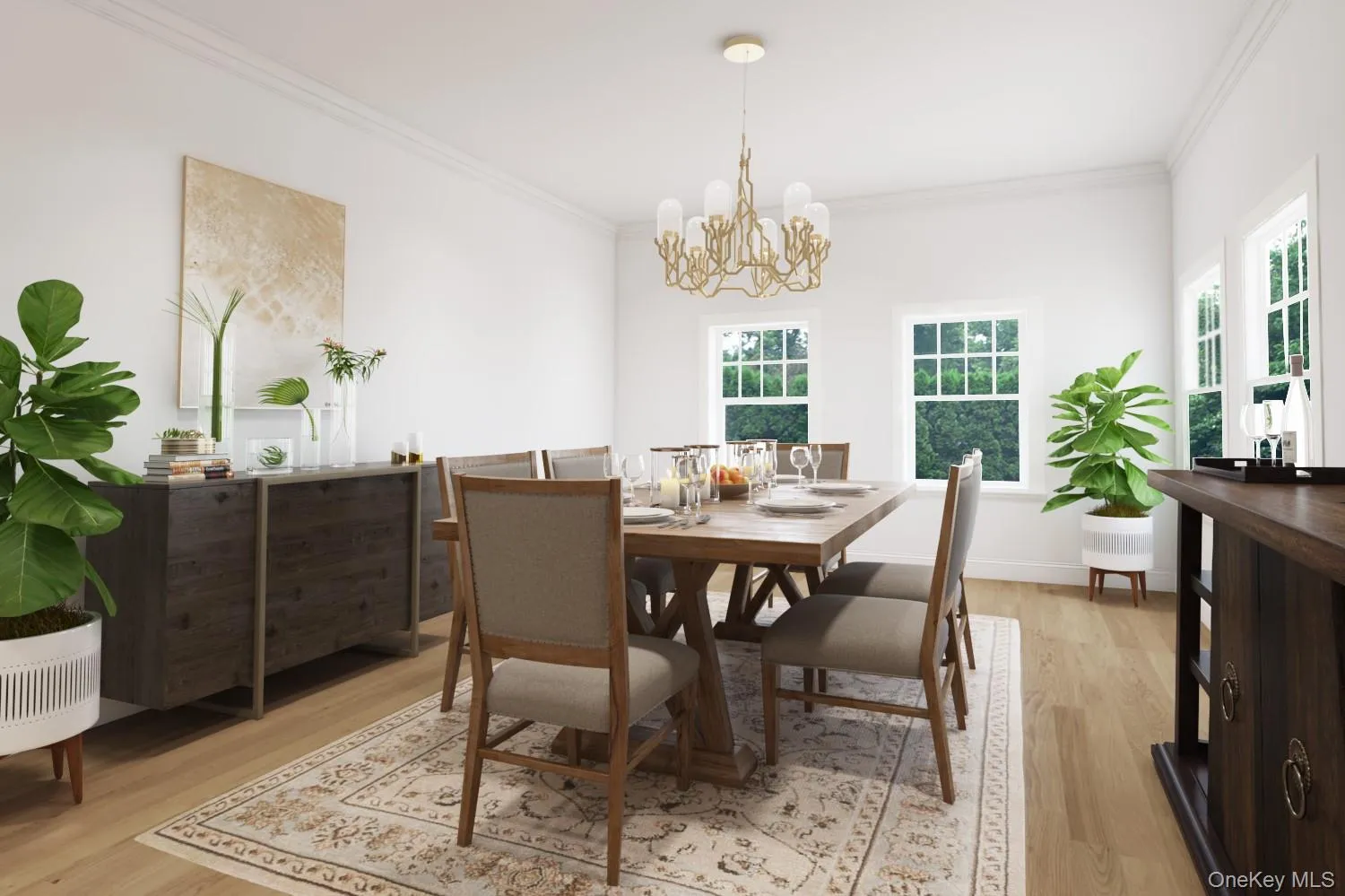 Dining space featuring light wood-style flooring, crown molding, and a chandelier Dining space featuring light wood-style flooring, crown molding, and a chandelier