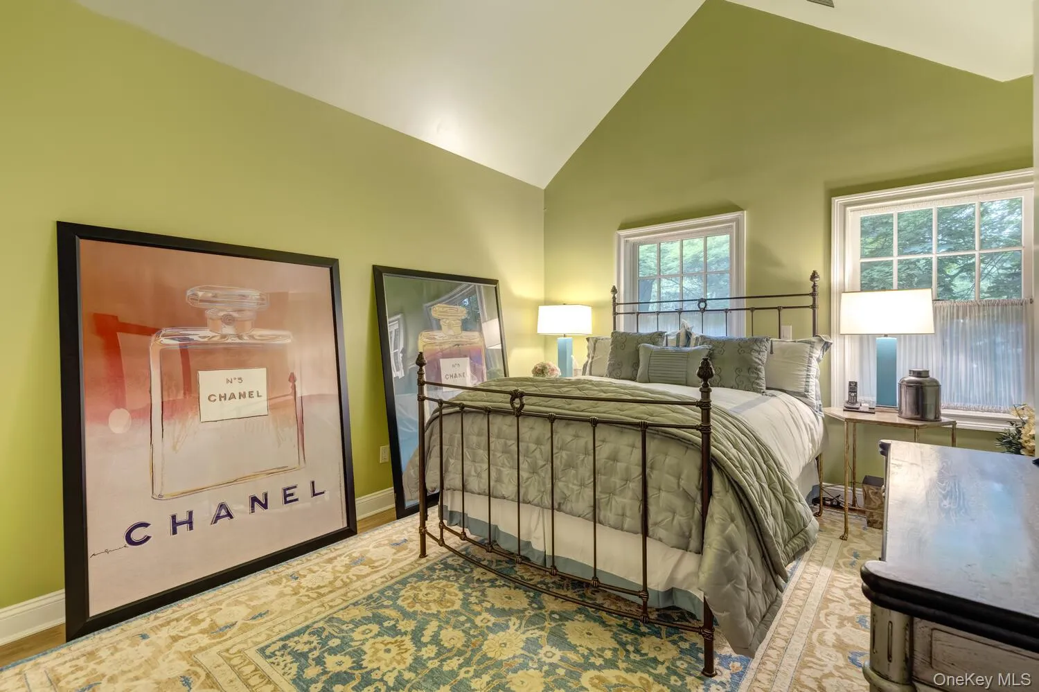 Bedroom featuring high vaulted ceiling Bedroom featuring high vaulted ceiling