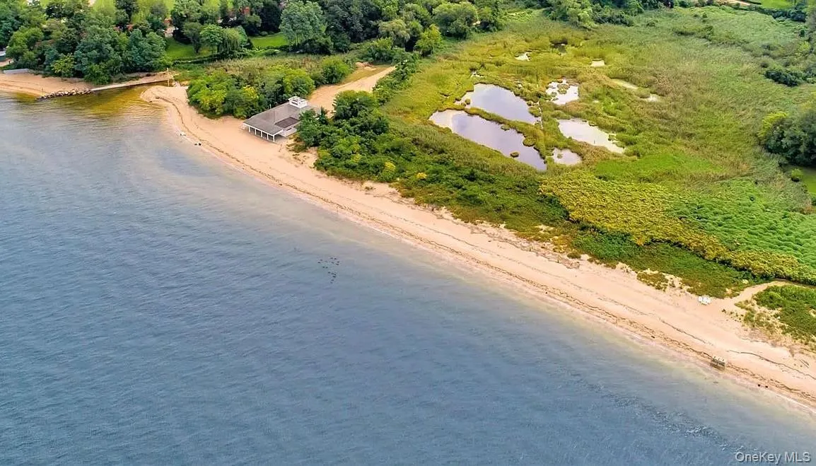 Aerial view of Crescent Beach featuring expansive coastline Aerial view of Crescent Beach featuring expansive coastline